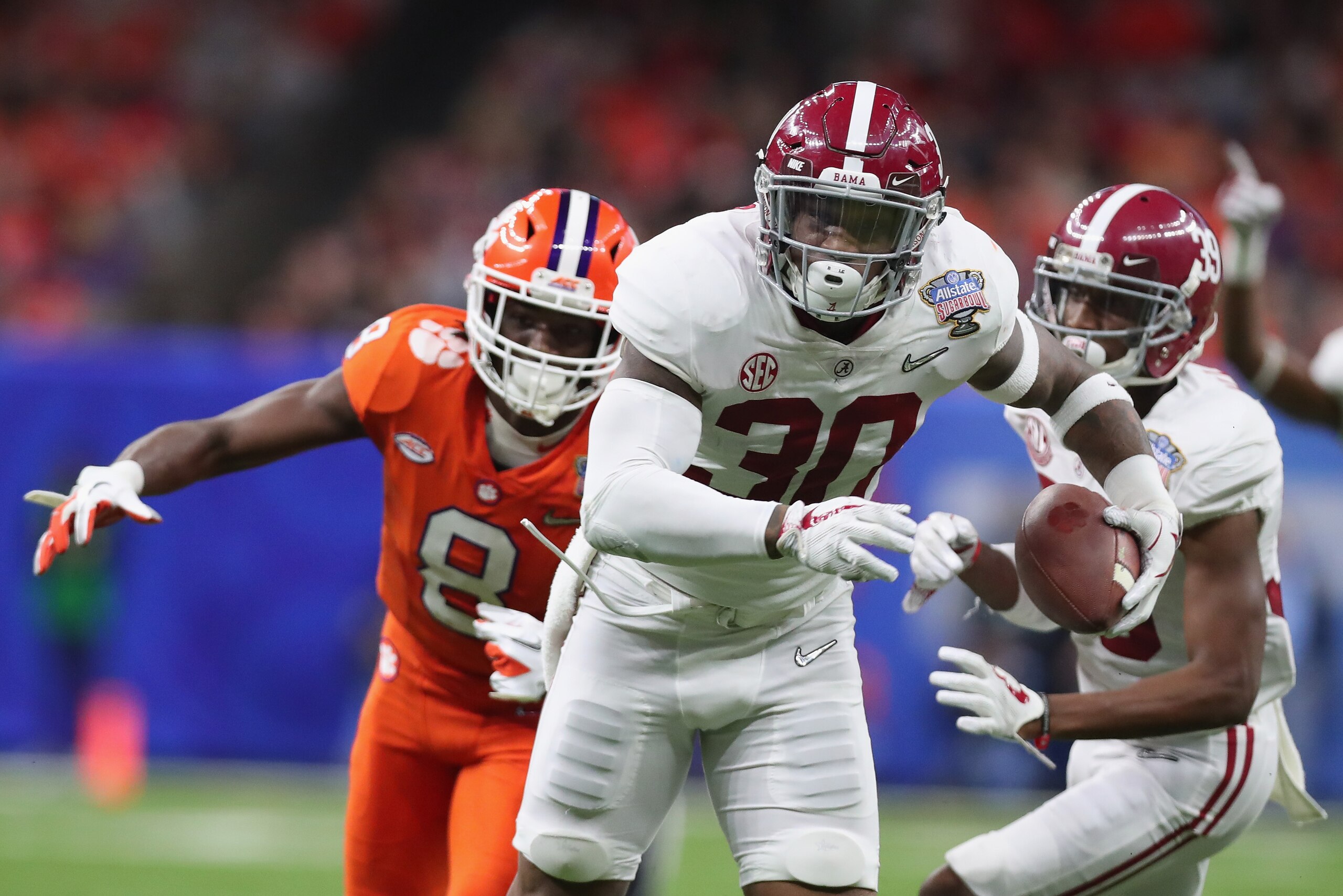 NEW ORLEANS, LA - JANUARY 01: Mack Wilson #30 of the Alabama Crimson Tide returns an interception for a touchdown in the second half of the AllState Sugar Bowl against the Clemson Tigers at the Mercedes-Benz Superdome on January 1, 2018 in New Orleans, L NEW ORLEANS, LA - JANUARY 01: Mack Wilson #30 of the Alabama Crimson Tide returns an interception for a touchdown in the second half of the AllState Sugar Bowl against the Clemson Tigers at the Mercedes-Benz Superdome on January 1, 2018 in New Orleans, L
