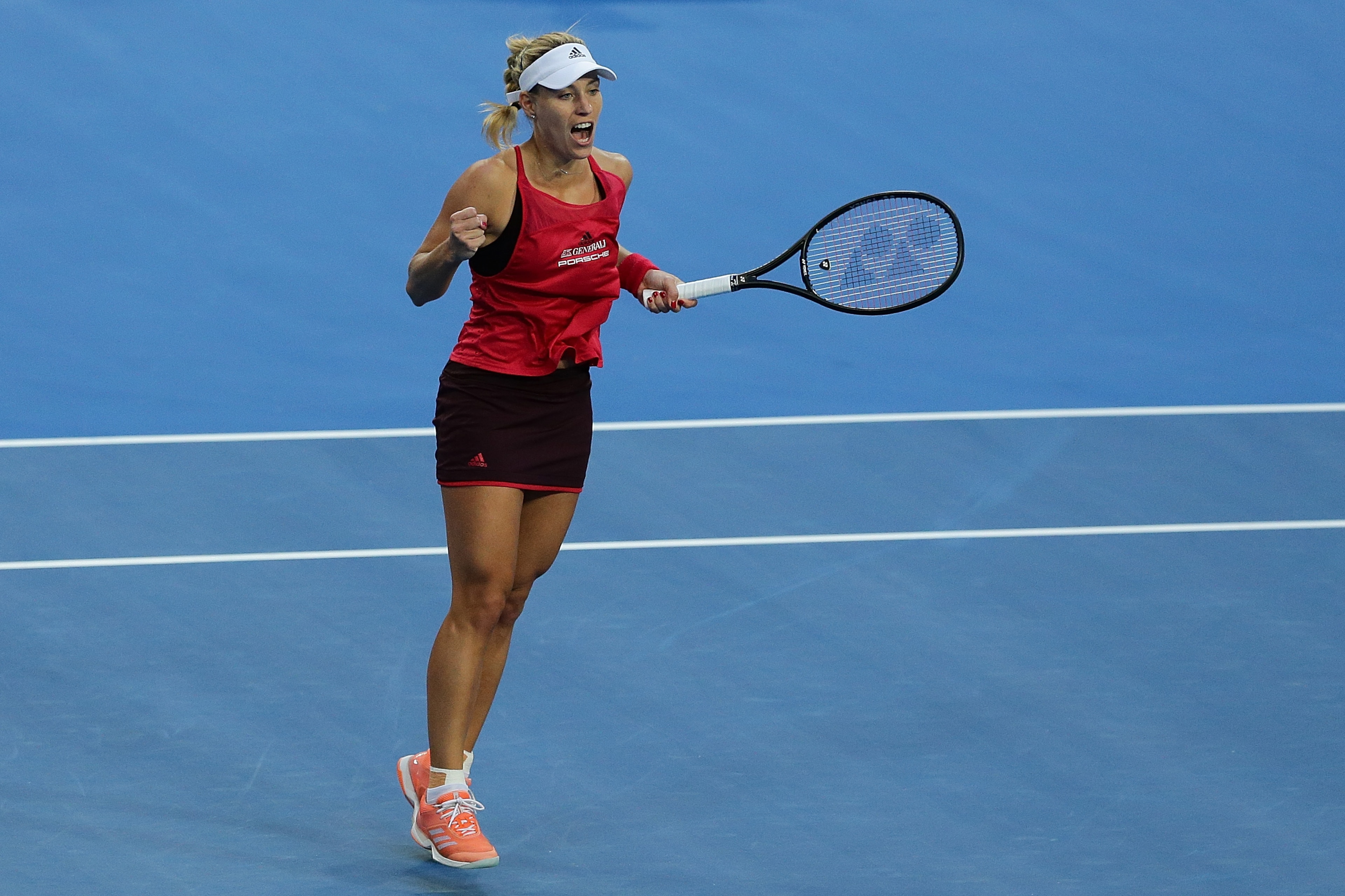 PERTH, AUSTRALIA - JANUARY 06:  Angelique Kerber of Germany celebrates a point to Belinda Bencic of Switzerland in the womens singles match on Day Seven of the  2018 Hopman Cup  at Perth Arena on January 6, 2018 in Perth, Australia.  (Photo by Will Russel