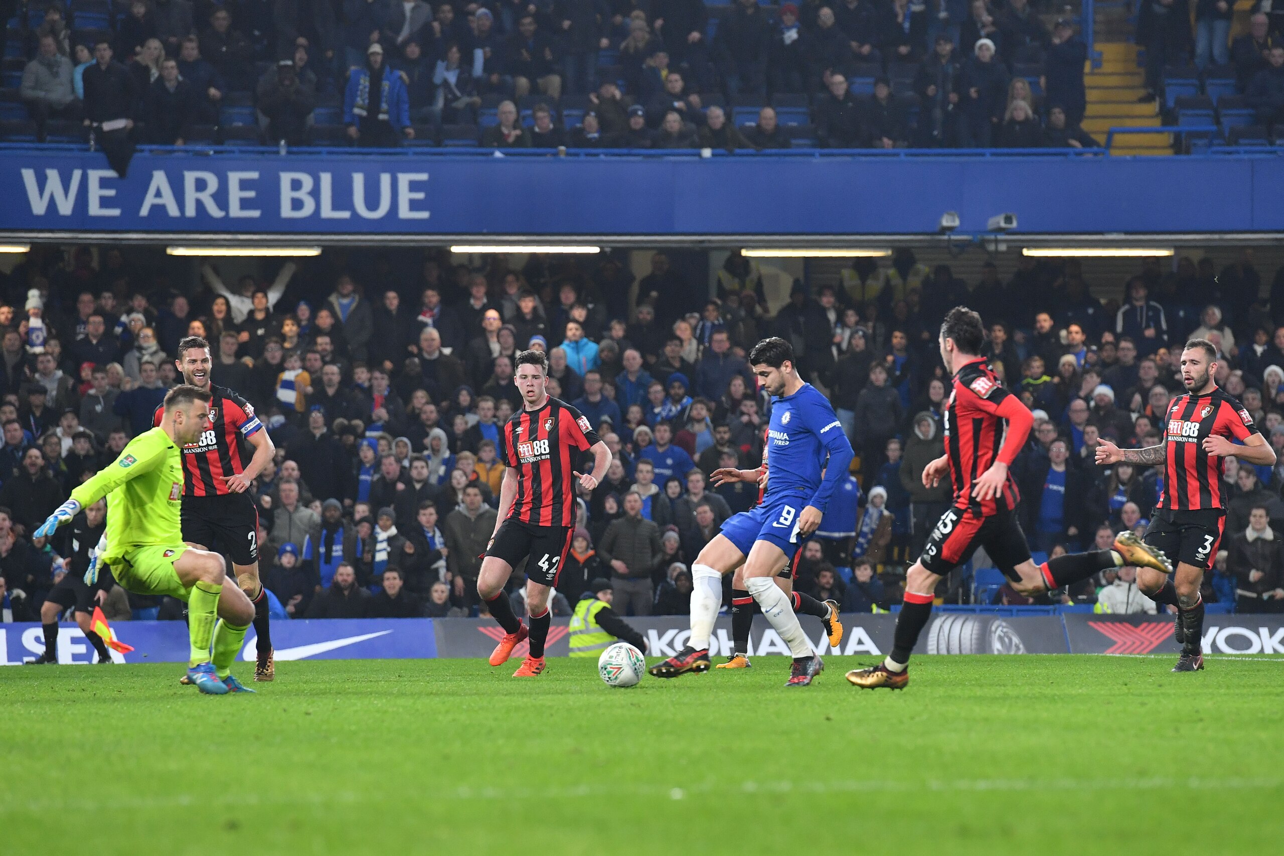 Chelsea's Spanish striker Alvaro Morata (C) scores the team's second goal during the English League Cup quarter-final football match between Chelsea and Bournemouth at Stamford Bridge Stadium, in southwest London on December 20, 2017. / AFP PHOTO / Ben ST