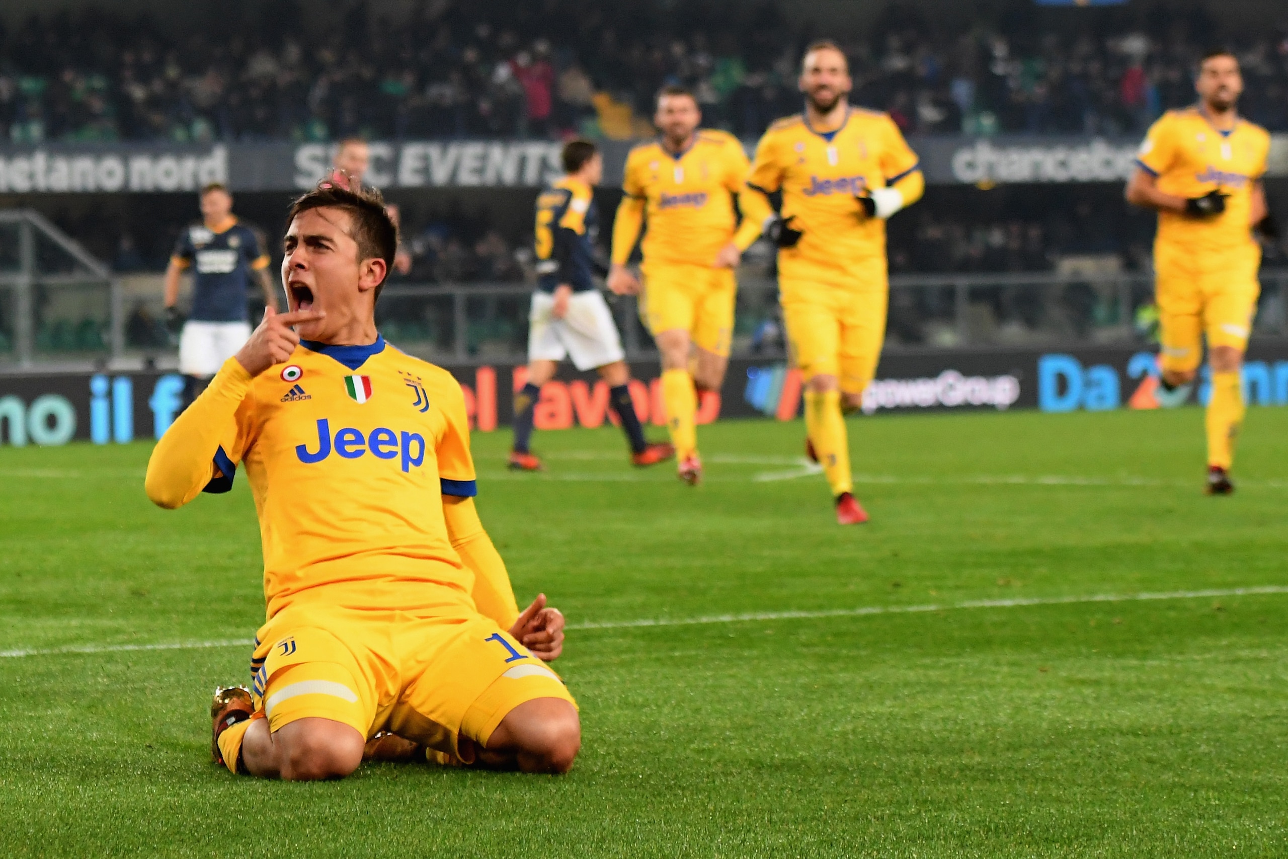VERONA, ITALY - DECEMBER 30:  Paulo Exequiel Dybala of Juventus celebrates after scoring his team third goal during the serie A match between Hellas Verona FC and Juventus at Stadio Marc'Antonio Bentegodi on December 30, 2017 in Verona, Italy.  (Photo by 