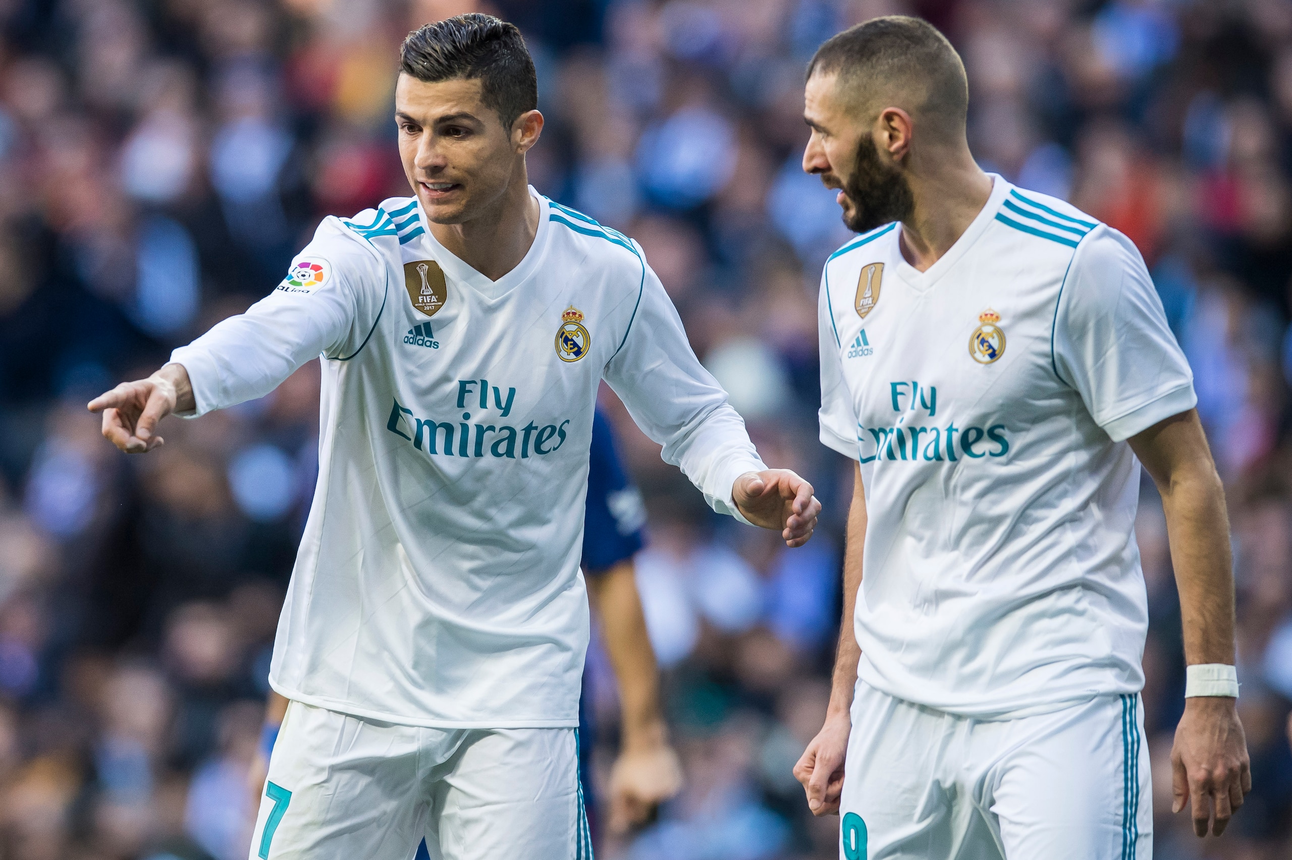 MADRID, SPAIN - DECEMBER 23: Cristiano Ronaldo (L) of Real Madrid talks to teammate Karim Benzema during the La Liga 2017-18 match between Real Madrid and FC Barcelona at Santiago Bernabeu Stadium on December 23 2017 in Madrid, Spain. (Photo by Power Spor