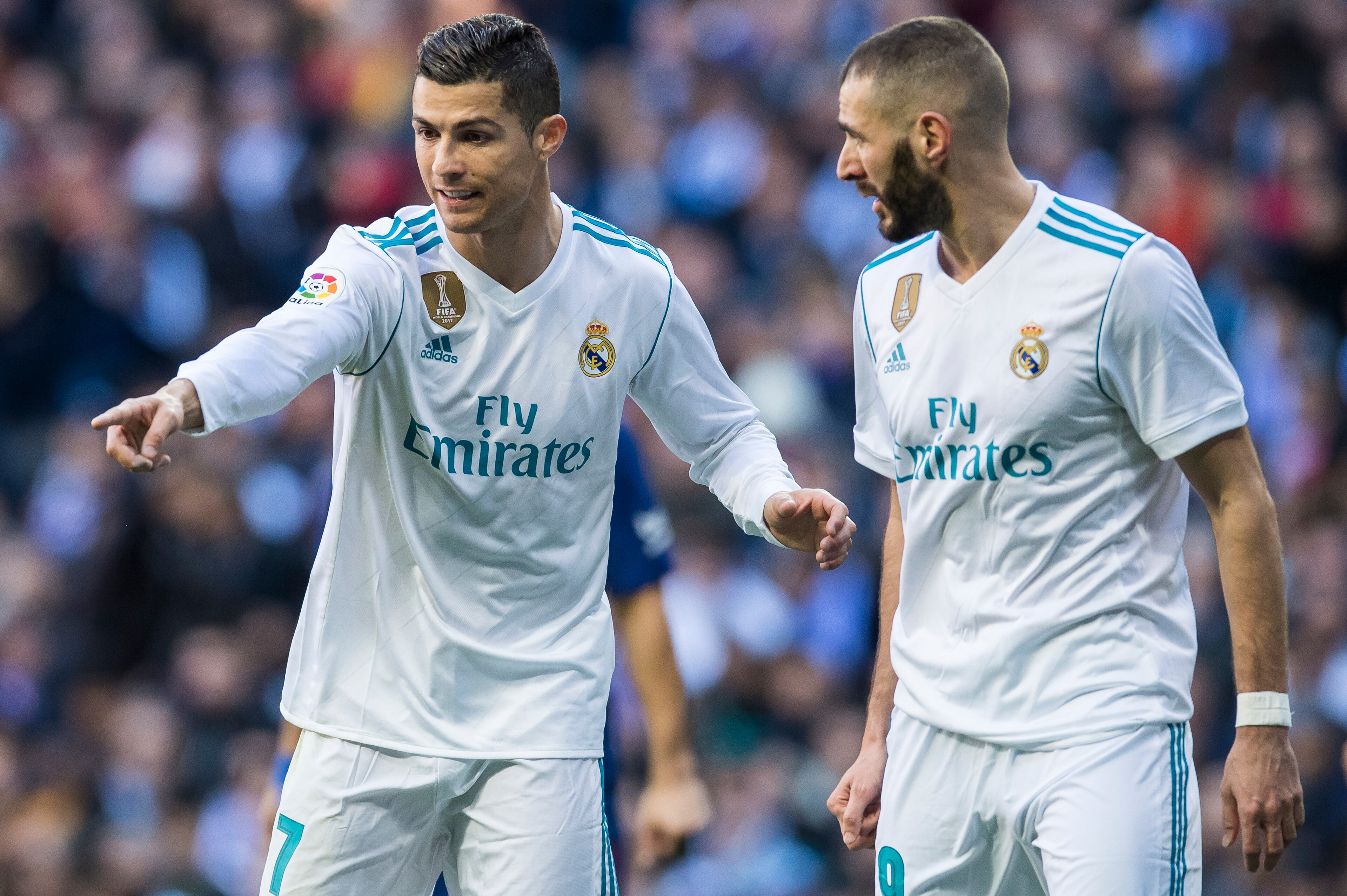 MADRID, SPAIN - DECEMBER 23: Cristiano Ronaldo (L) of Real Madrid talks to teammate Karim Benzema during the La Liga 2017-18 match between Real Madrid and FC Barcelona at Santiago Bernabeu Stadium on December 23 2017 in Madrid, Spain. (Photo by Power Spor