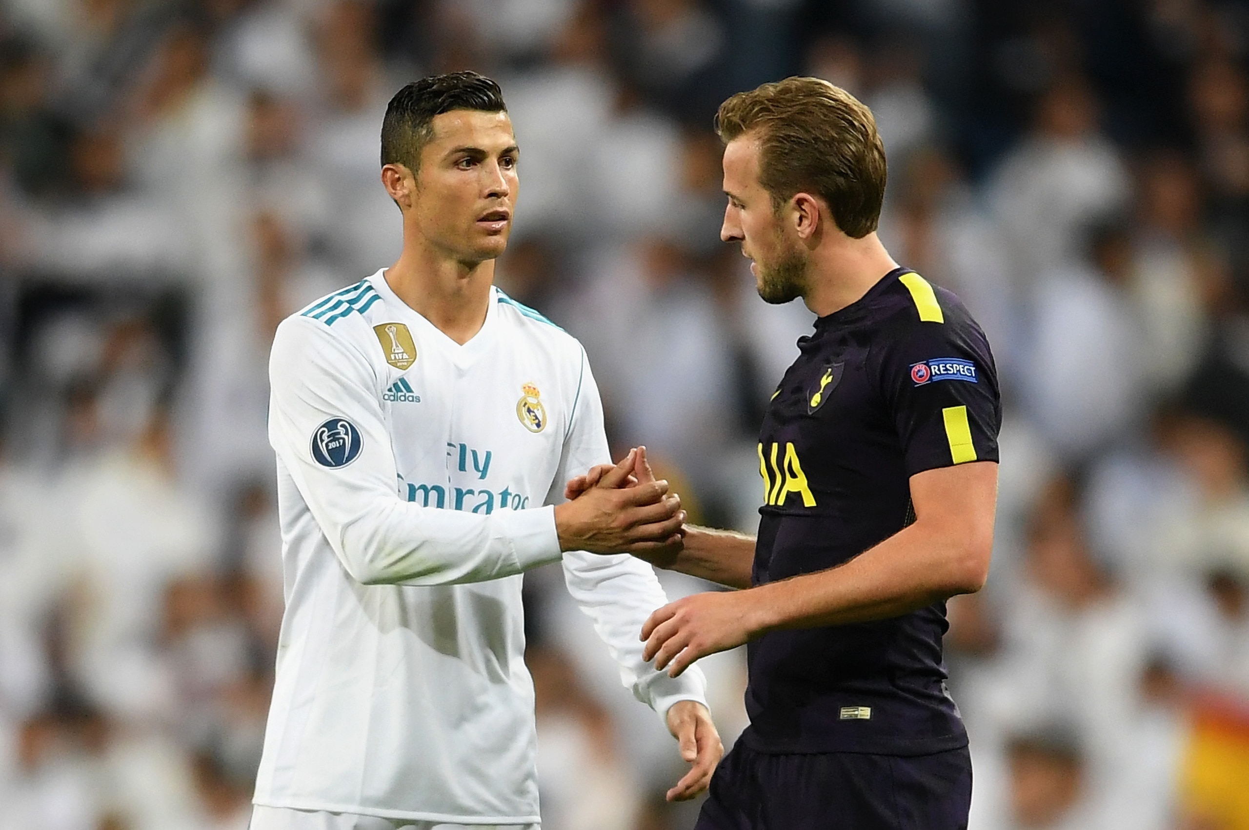 MADRID, SPAIN - OCTOBER 17:  Cristiano Ronaldo of Real Madrid and Harry Kane of Tottenham Hotspur speak after the UEFA Champions League group H match between Real Madrid and Tottenham Hotspur at Estadio Santiago Bernabeu on October 17, 2017 in Madrid, Spa