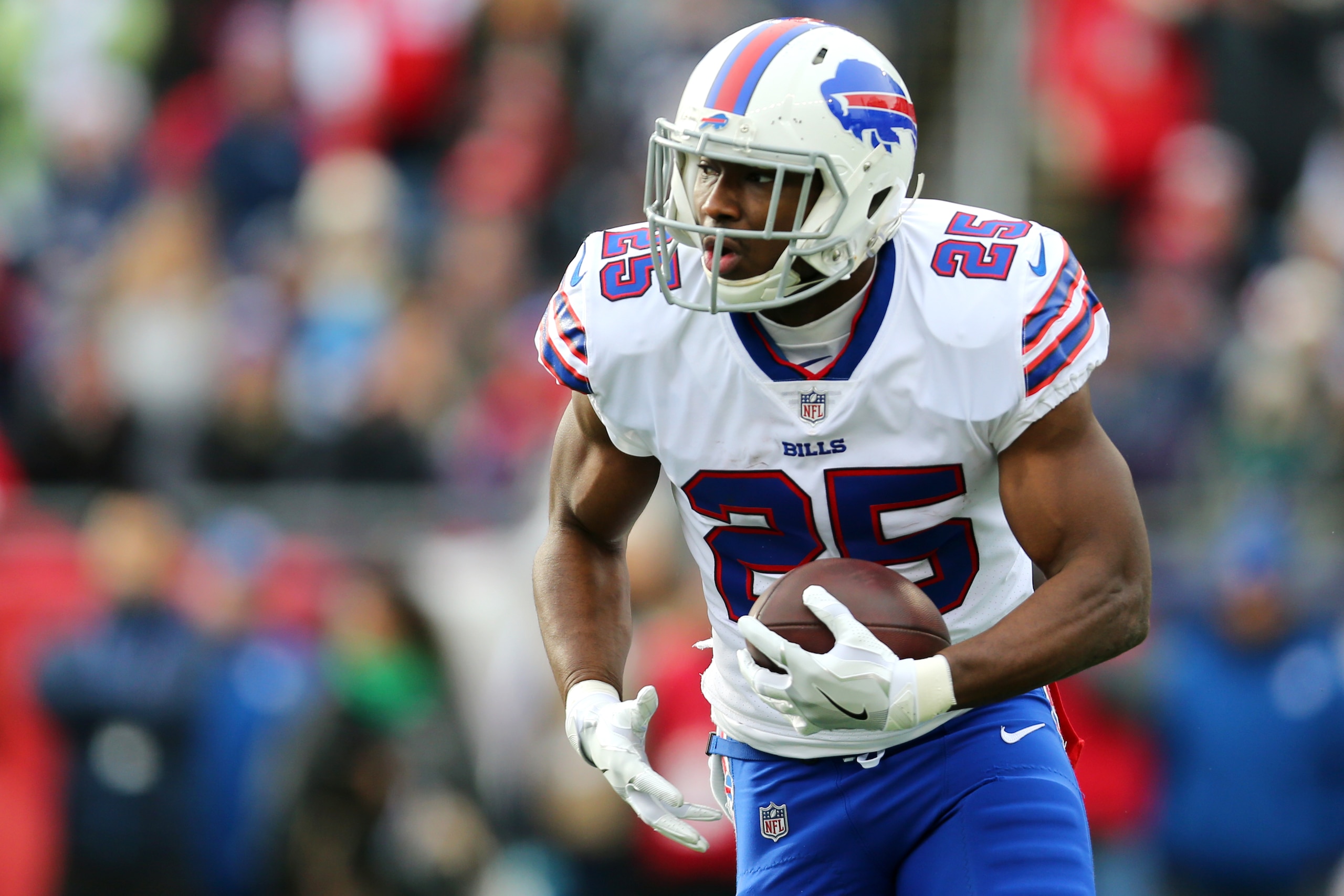 FOXBORO, MA - DECEMBER 24: LeSean McCoy #25 of the Buffalo Bills runs the ball against the New England Patriots during the first half at Gillette Stadium on December 24, 2017 in Foxboro, Massachusetts. (Photo by Maddie Meyer/Getty Images)