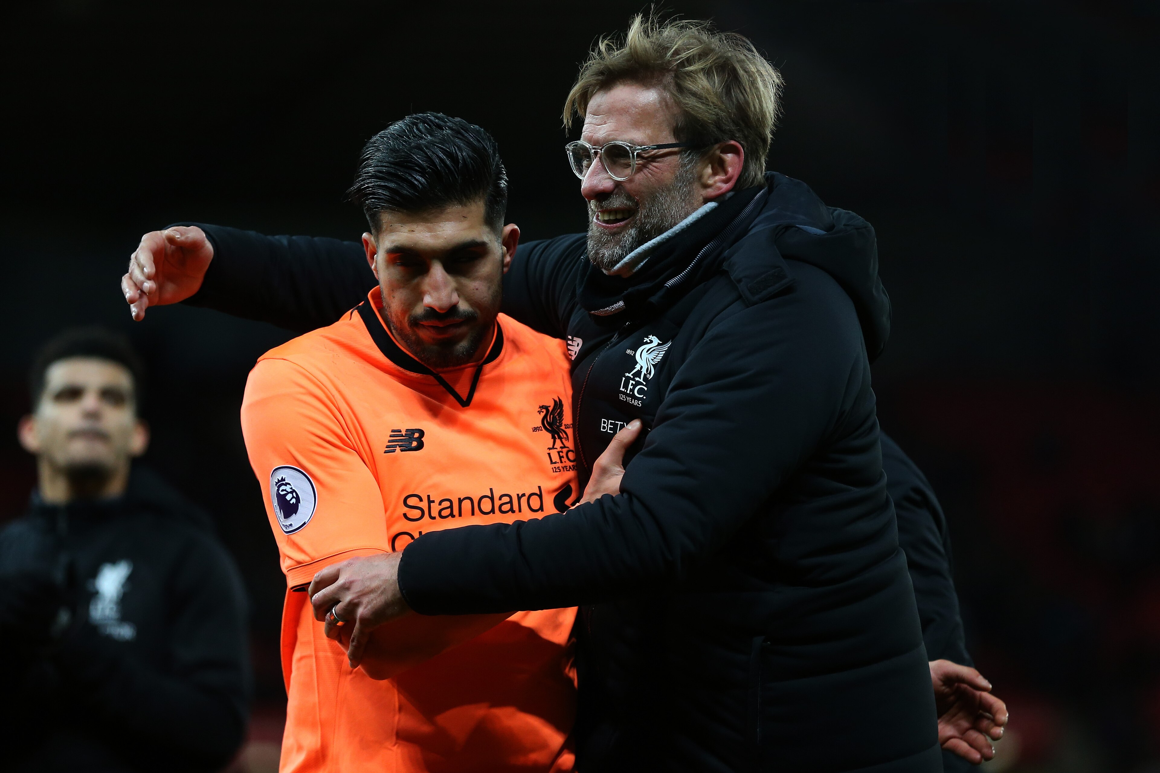 STOKE ON TRENT, ENGLAND - NOVEMBER 29: Jurgen Klopp the head coach / manager of Liverpool embraces Emre Can of Liverpool at full time after the Premier League match between Stoke City and Liverpool at Bet365 Stadium on November 29, 2017 in Stoke on Trent,