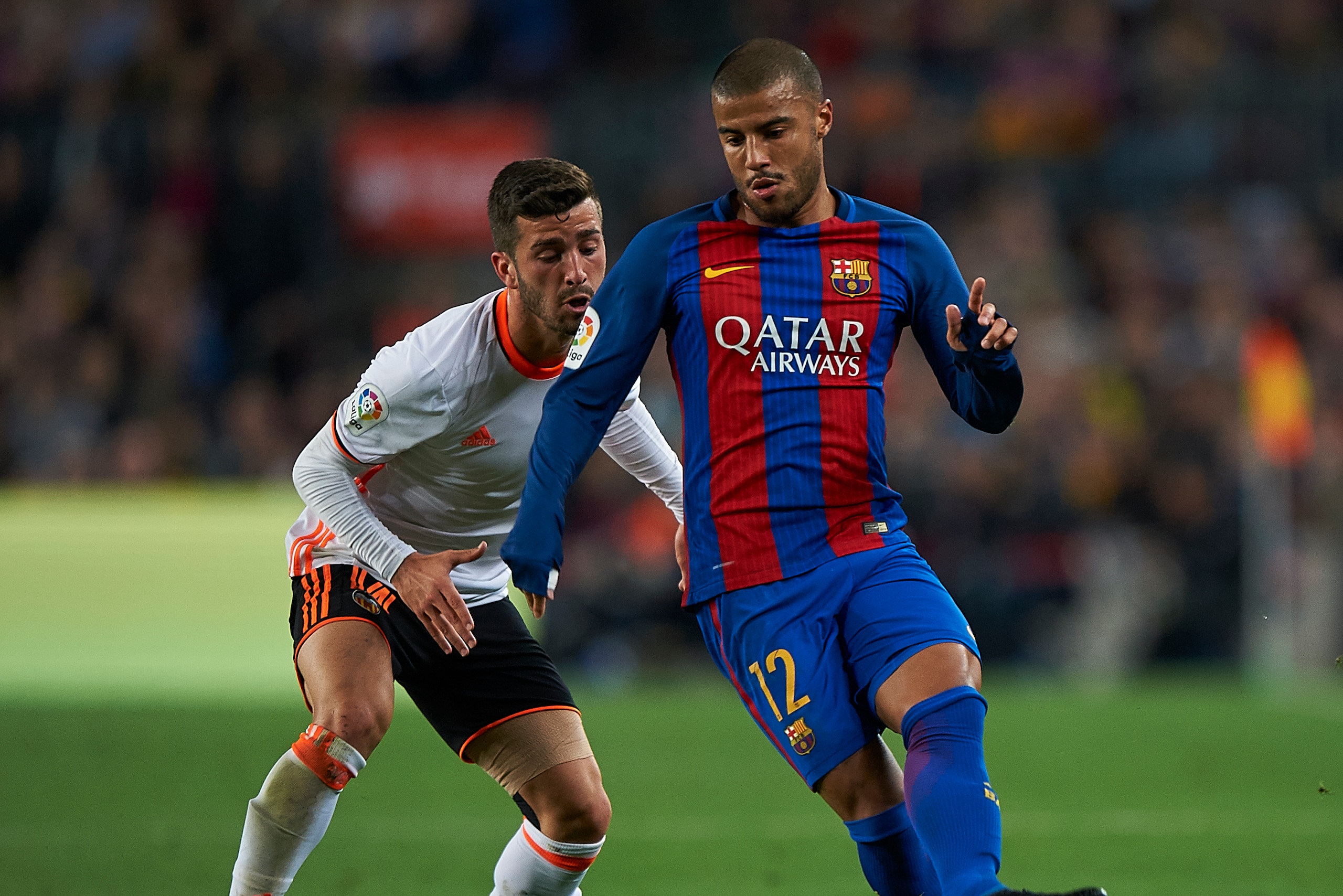 BARCELONA, SPAIN - MARCH 19: Rafinha (R) of Barcelona competes for the ball with Jose Luis Gaya of Valencia during the La Liga match between FC Barcelona and Valencia CF at Camp Nou Stadium on March 19, 2017 in Barcelona, Spain. (Photo by fotopress/Get BARCELONA, SPAIN - MARCH 19: Rafinha (R) of Barcelona competes for the ball with Jose Luis Gaya of Valencia during the La Liga match between FC Barcelona and Valencia CF at Camp Nou Stadium on March 19, 2017 in Barcelona, Spain. (Photo by fotopress/Get