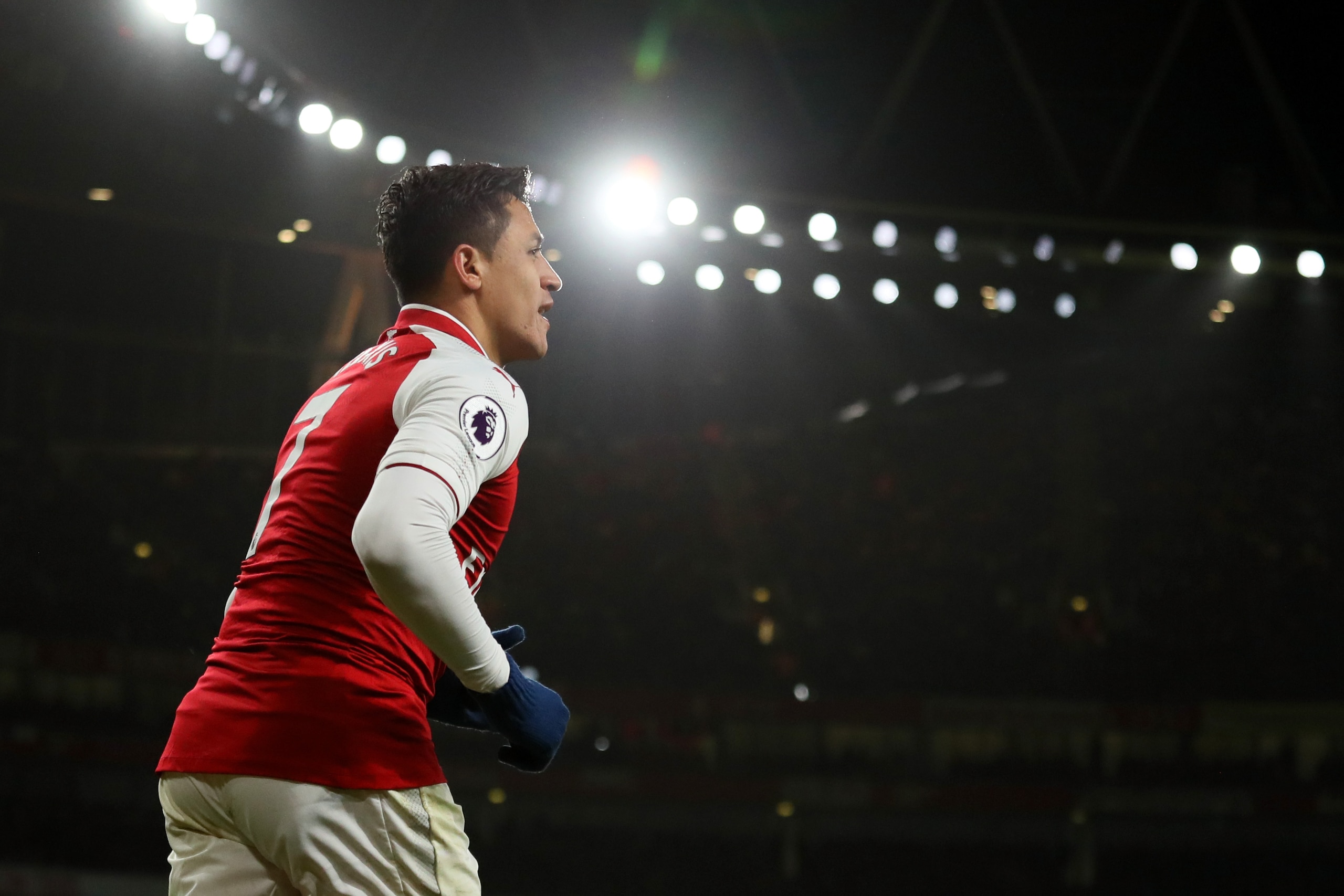 LONDON, ENGLAND - JANUARY 03: Alexis Sanchez of Arsenal looks on during the Premier League match between Arsenal and Chelsea at Emirates Stadium on January 3, 2018 in London, England. (Photo by Matthew Ashton - AMA/Getty Images) LONDON, ENGLAND - JANUARY 03: Alexis Sanchez of Arsenal looks on during the Premier League match between Arsenal and Chelsea at Emirates Stadium on January 3, 2018 in London, England. (Photo by Matthew Ashton - AMA/Getty Images)