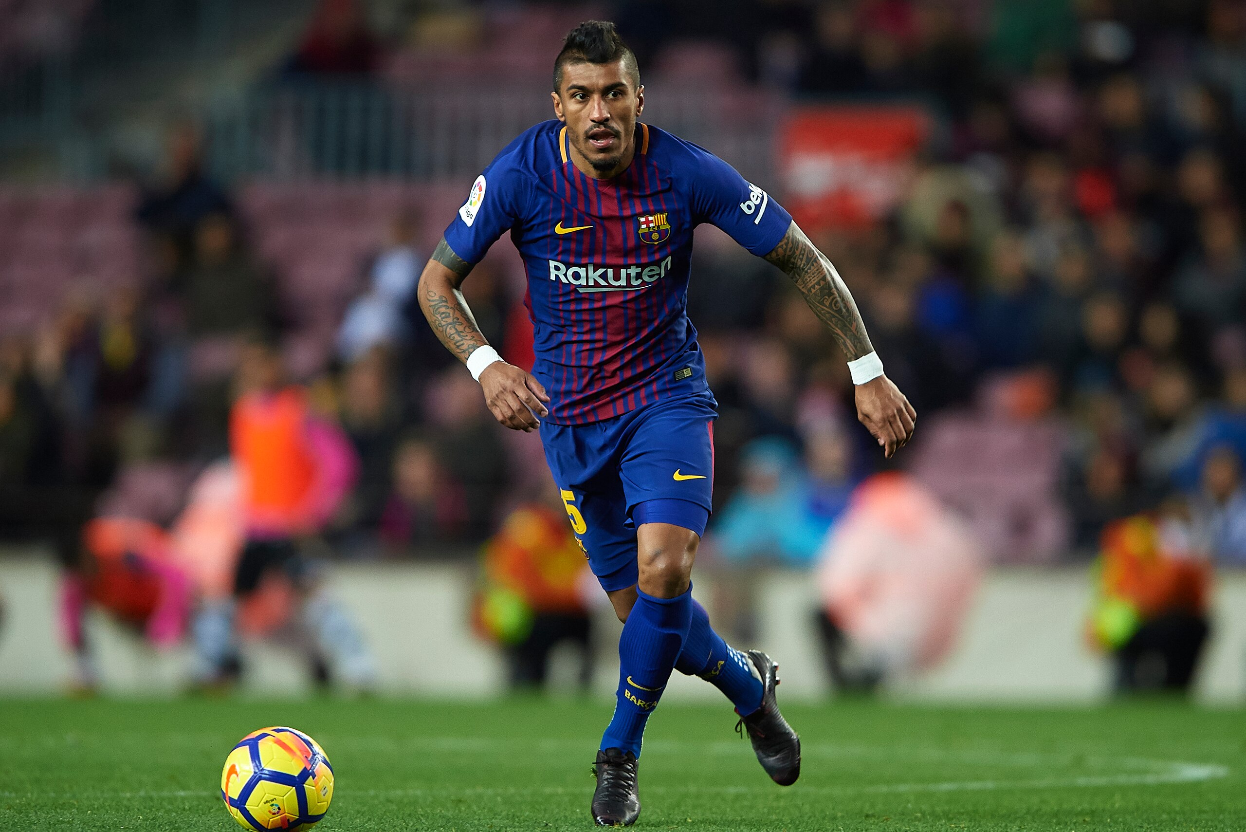 BARCELONA, SPAIN - JANUARY 07:  Paulinho of Barcelona in action during the La Liga match between Barcelona and Levante at Camp Nou on January 7, 2018 in Barcelona, Spain.  (Photo by Manuel Queimadelos Alonso/Getty Images)