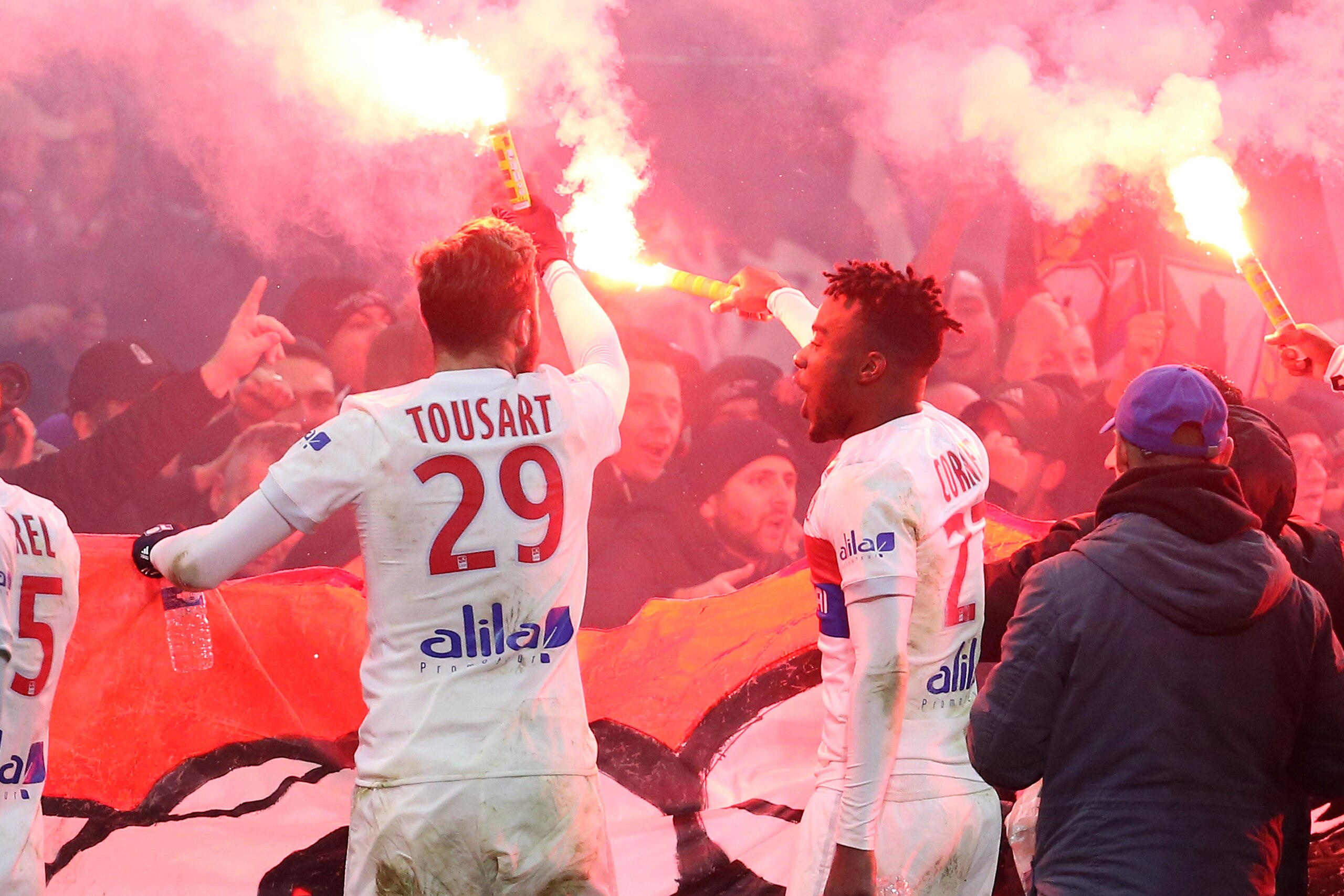 LYON, FRANCE - DECEMBER 17: Lucas Tousart, Maxwel Cornet of Lyon celebrate the victory following the French Ligue 1 match between Olympique Lyonnais (OL) and Olympique de Marseille (OM) at Groupama Stadium on December 17, 2017 in Lyon, France. (Photo by J