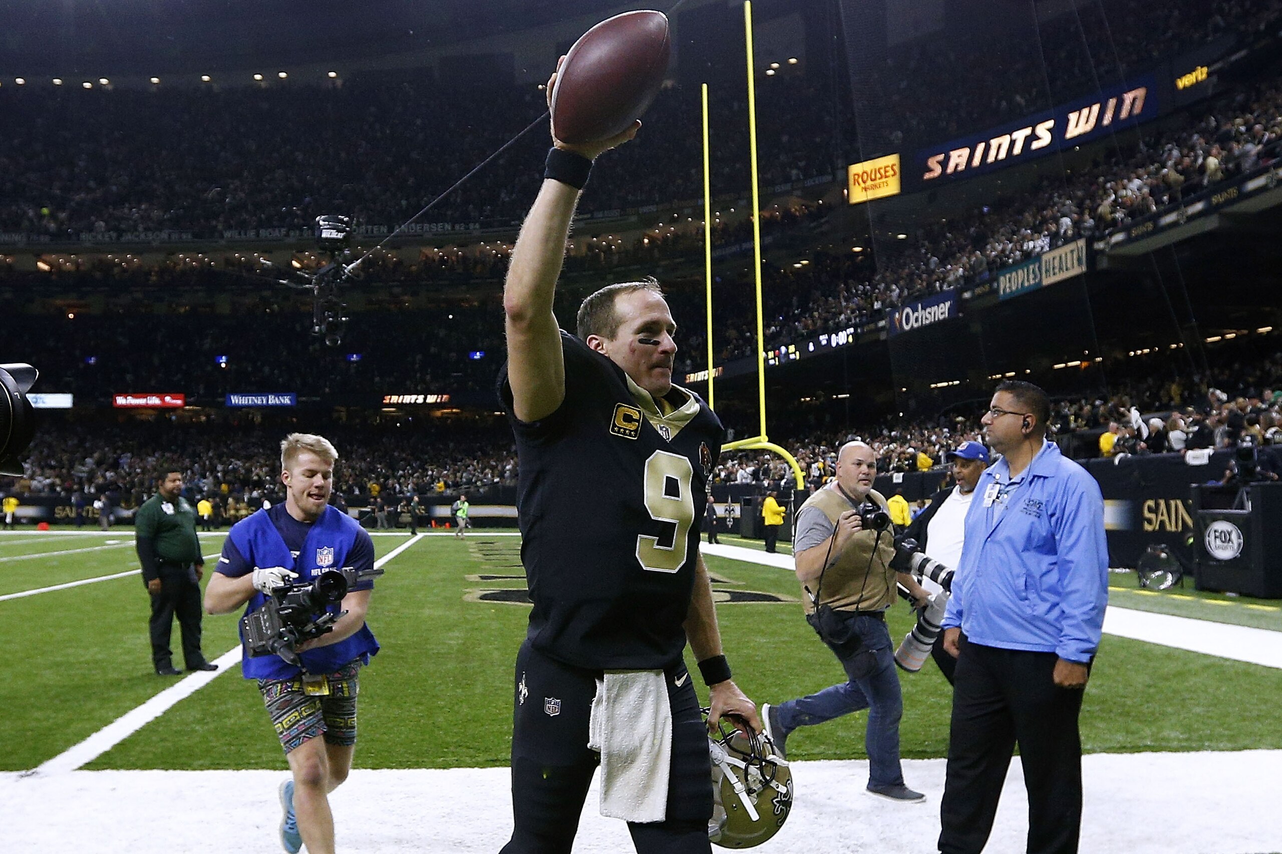 NEW ORLEANS, LA - JANUARY 07: Drew Brees #9 of the New Orleans Saints celebrates after the NFC Wild Card playoff game against the Carolina Panthers at the Mercedes-Benz Superdome on January 7, 2018 in New Orleans, Louisiana. (Photo by Jonathan Bachman/Get