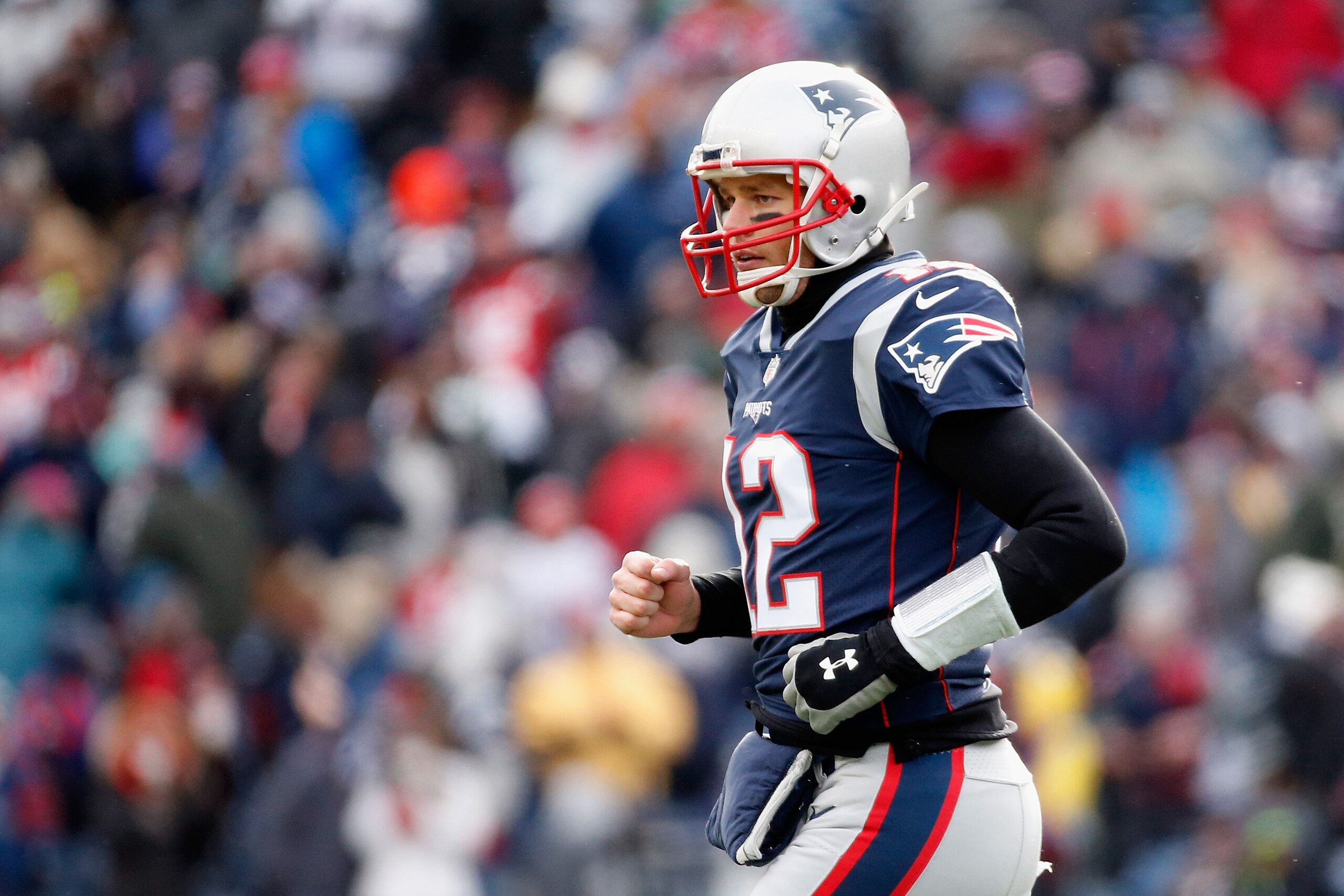 FOXBORO, MA - DECEMBER 31: Tom Brady #12 of the New England Patriots reacts after a rushing touchdown by Dion Lewis #33 (not pictured) during the first quarter against the New York Jets at Gillette Stadium on December 31, 2017 in Foxboro, Massachusetts. FOXBORO, MA - DECEMBER 31: Tom Brady #12 of the New England Patriots reacts after a rushing touchdown by Dion Lewis #33 (not pictured) during the first quarter against the New York Jets at Gillette Stadium on December 31, 2017 in Foxboro, Massachusetts.