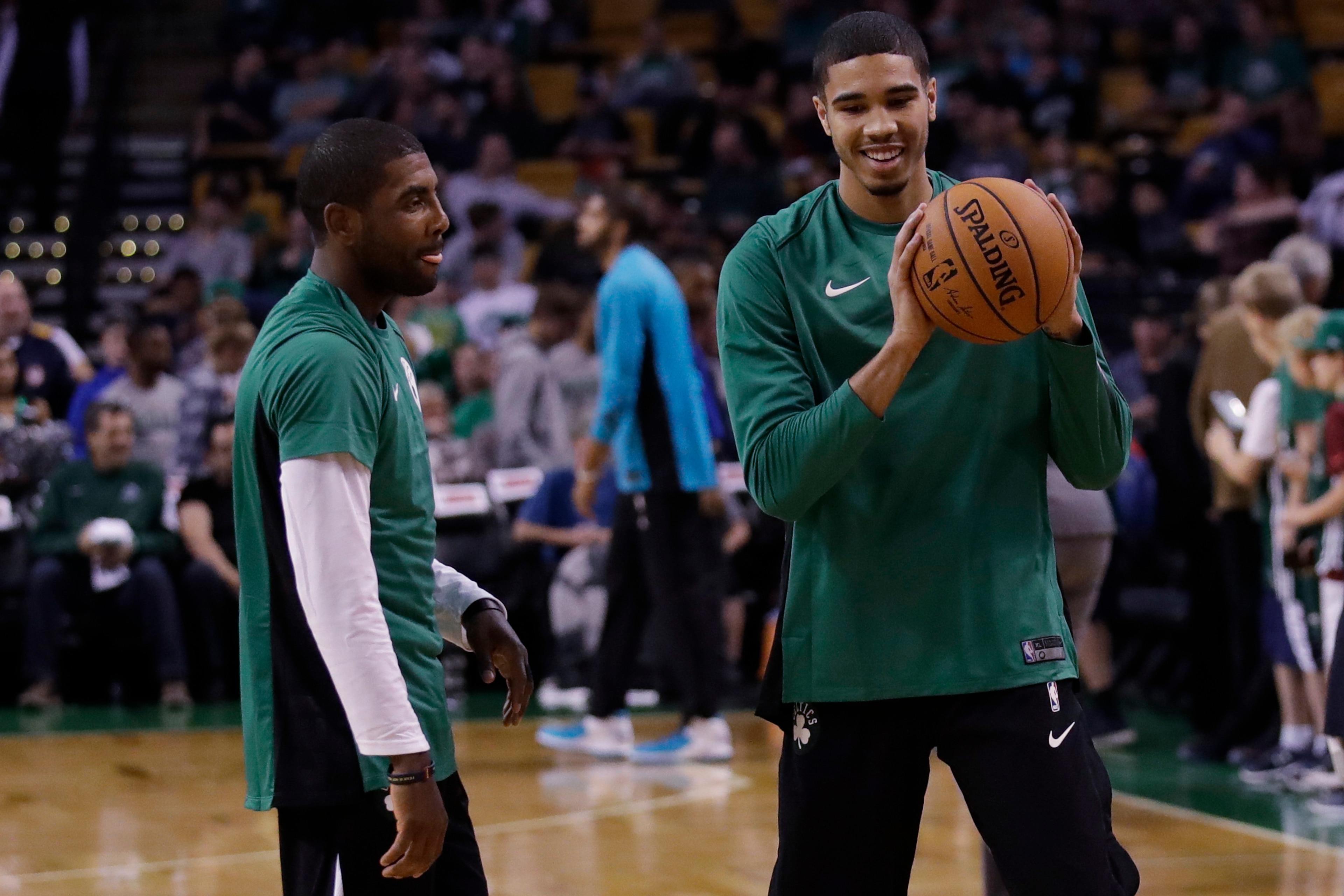 Kyrie Irving has taken to being a mentor to Celtics first-round pick Jayson Tatum. The two knew each other before becoming teammates this season.