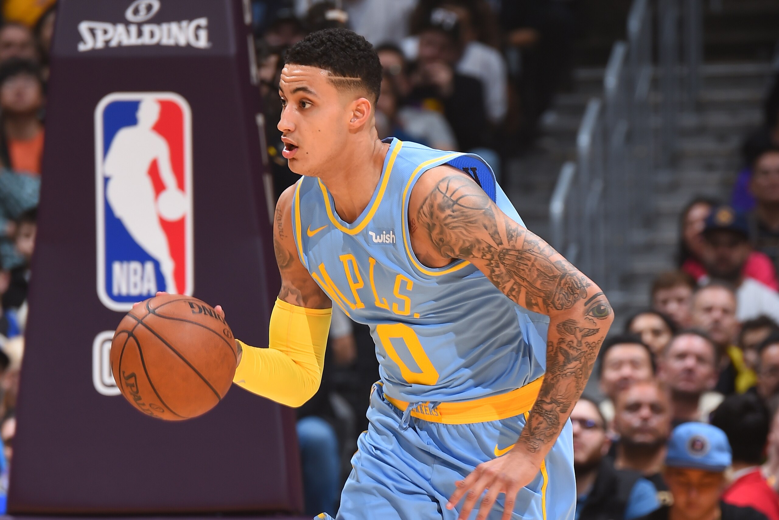 LOS ANGELES, CA - JANUARY 3:  Kyle Kuzma #0 of the Los Angeles Lakers handles the ball against the Oklahoma City Thunder on January 3, 2018 at STAPLES Center in Los Angeles, California. NOTE TO USER: User expressly acknowledges and agrees that, by downloa