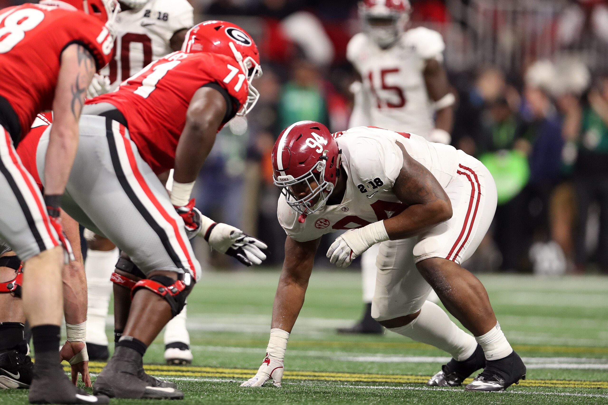 ATLANTA, GA - JANUARY 08: Da'Ron Payne #94 of the Alabama Crimson Tide lines up against the Georgia Bulldogs during the third quarter in the CFP National Championship presented by AT&T at Mercedes-Benz Stadium on January 8, 2018 in Atlanta, Georgia. (Pho ATLANTA, GA - JANUARY 08: Da'Ron Payne #94 of the Alabama Crimson Tide lines up against the Georgia Bulldogs during the third quarter in the CFP National Championship presented by AT&T at Mercedes-Benz Stadium on January 8, 2018 in Atlanta, Georgia. (Pho