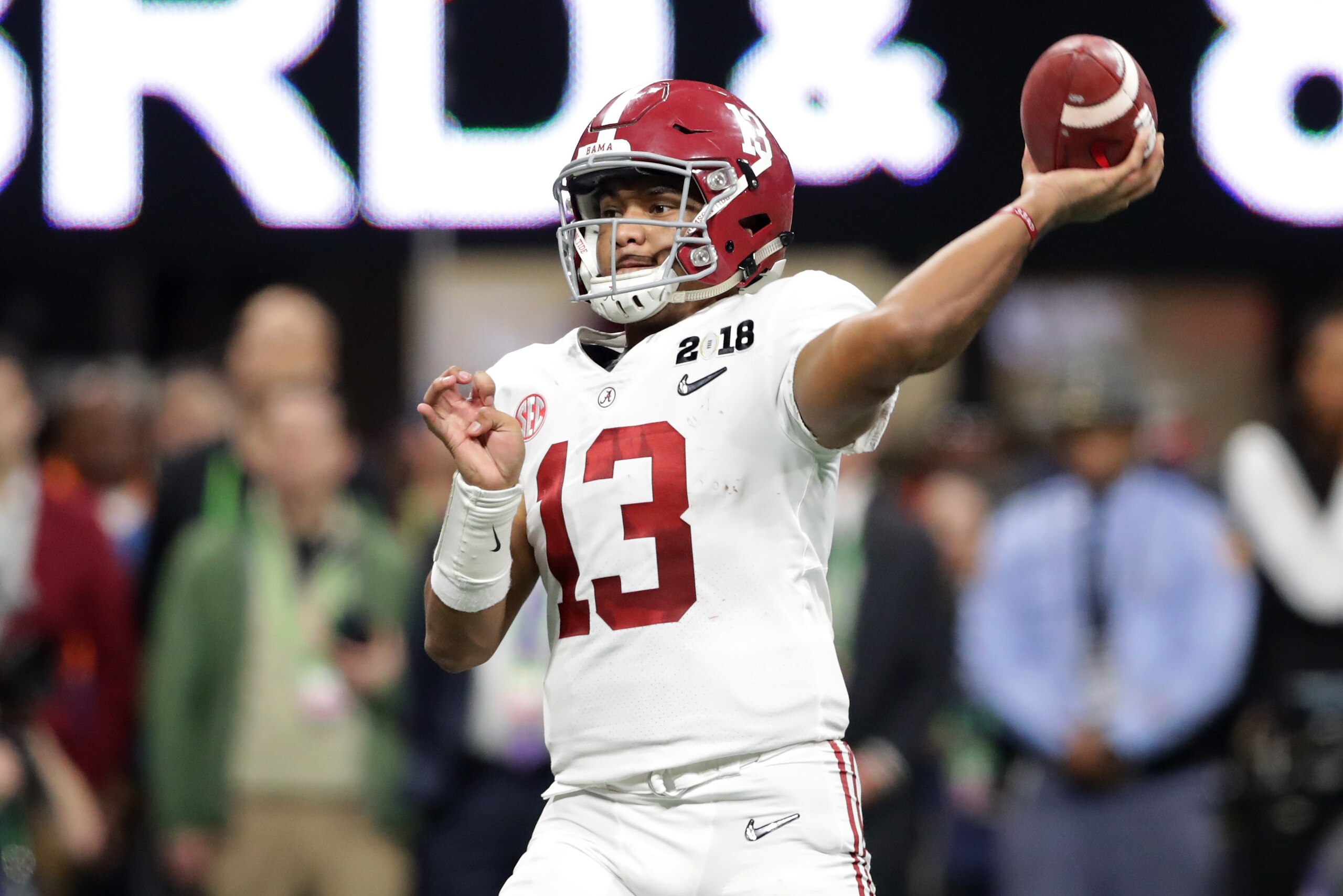 ATLANTA, GA - JANUARY 08: Tua Tagovailoa #13 of the Alabama Crimson Tide throws a pass during the second half against the Georgia Bulldogs in the CFP National Championship presented by AT&T at Mercedes-Benz Stadium on January 8, 2018 in Atlanta, Georgia. 