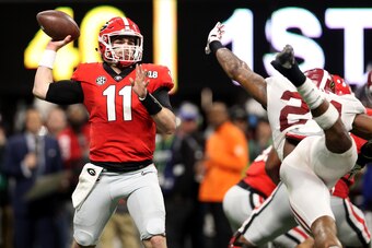 ATLANTA, GA - JANUARY 08: Jake Fromm #11 of the Georgia Bulldogs throws a pass during the second quarter against the Alabama Crimson Tide in the CFP National Championship presented by AT&T at Mercedes-Benz Stadium on January 8, 2018 in Atlanta, Georgia.  