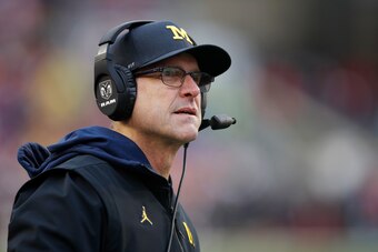 MADISON, WI - NOVEMBER 18: Head coach Jim Harbaugh of the Michigan Wolverines looks on during a game against the Wisconsin Badgers at Camp Randall Stadium on November 18, 2017 in Madison, Wisconsin. Wisconsin won 24-10. (Photo by Joe Robbins/Getty Images)