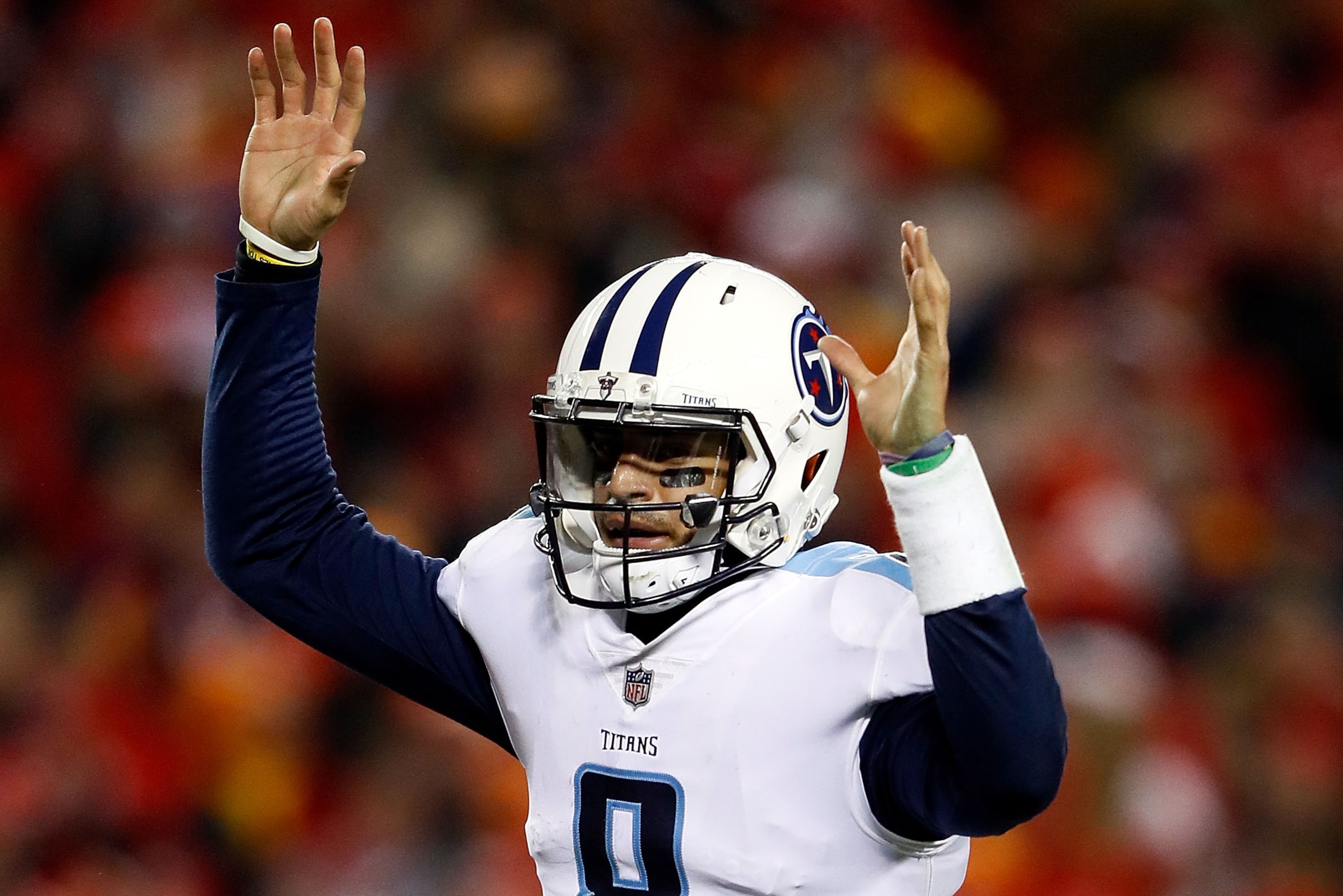 KANSAS CITY, MO - JANUARY 06:  Quarterback Marcus Mariota #8 of the Tennessee Titans celebrates a touchdown as the the Titans defeat the Kansas City Chiefs 22-21 to win the AFC Wild Card playoff game at Arrowhead Stadium on January 6, 2018 in Kansas City,
