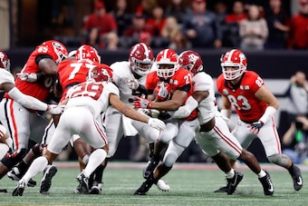 ATLANTA, GA - JANUARY 08: Nick Chubb #27 of the Georgia Bulldogs runs the ball during the second quarter against the Alabama Crimson Tide in the CFP National Championship presented by AT&T at Mercedes-Benz Stadium on January 8, 2018 in Atlanta, Georgia.  