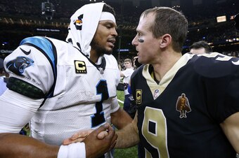 NEW ORLEANS, LA - JANUARY 07: Drew Brees #9 of the New Orleans Saints and Cam Newton #1 of the Carolina Panthers greet after the NFC Wild Card playoff game at the Mercedes-Benz Superdome on January 7, 2018 in New Orleans, Louisiana. (Photo by Jonathan Bac