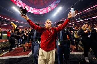 ATLANTA, GA - JANUARY 08:  Head coach Nick Saban of the Alabama Crimson Tide celebrates beating the Georgia Bulldogs in overtime to win the CFP National Championship presented by AT&T at Mercedes-Benz Stadium on January 8, 2018 in Atlanta, Georgia. Alabam