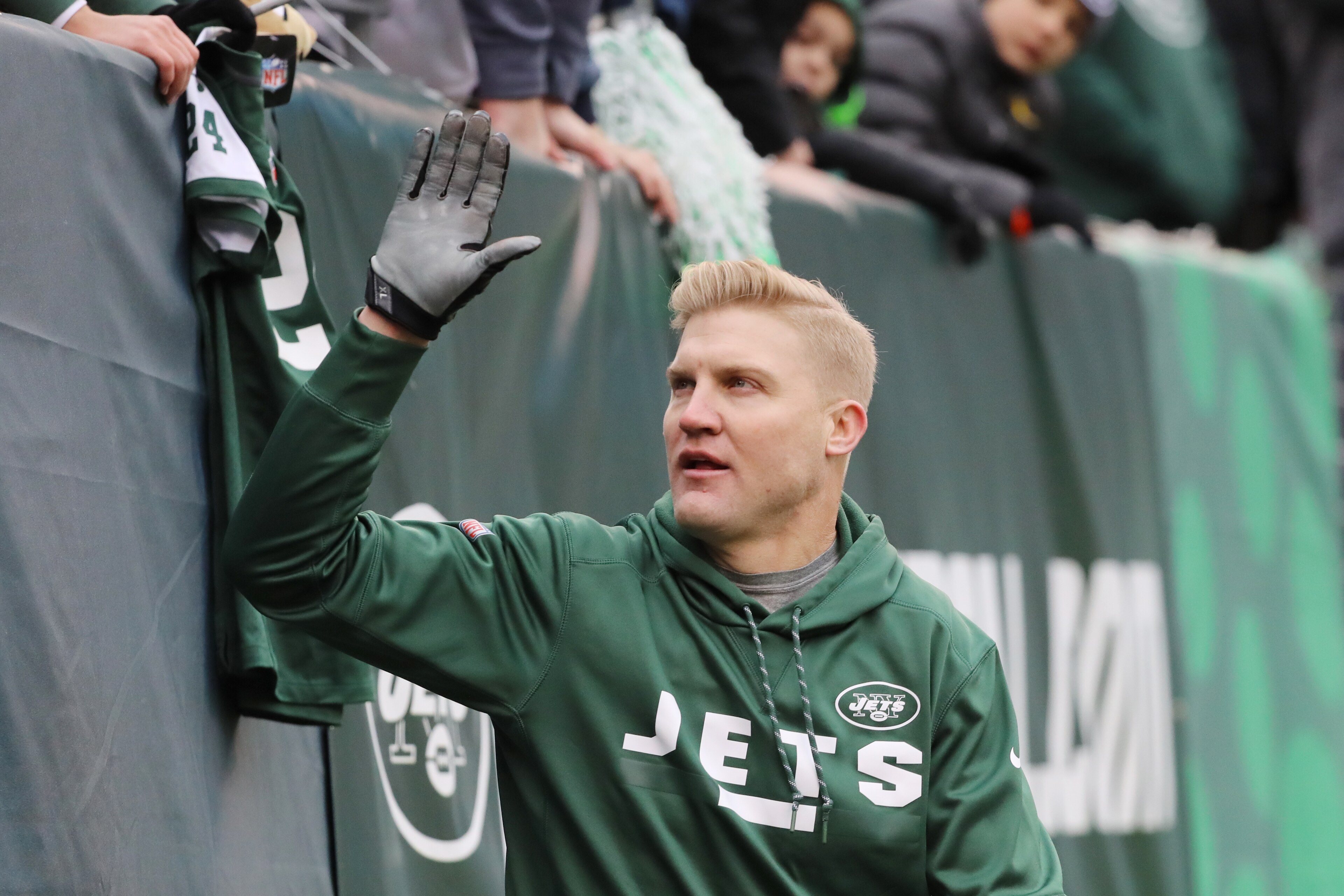 EAST RUTHERFORD, NJ - DECEMBER 24: Josh McCown #15 of the New York Jets high fives the fans prior to an NFL game against the Los Angeles Chargers at MetLife Stadium on December 24, 2017 in East Rutherford, New Jersey.  (Photo by Abbie Parr/Getty Images)