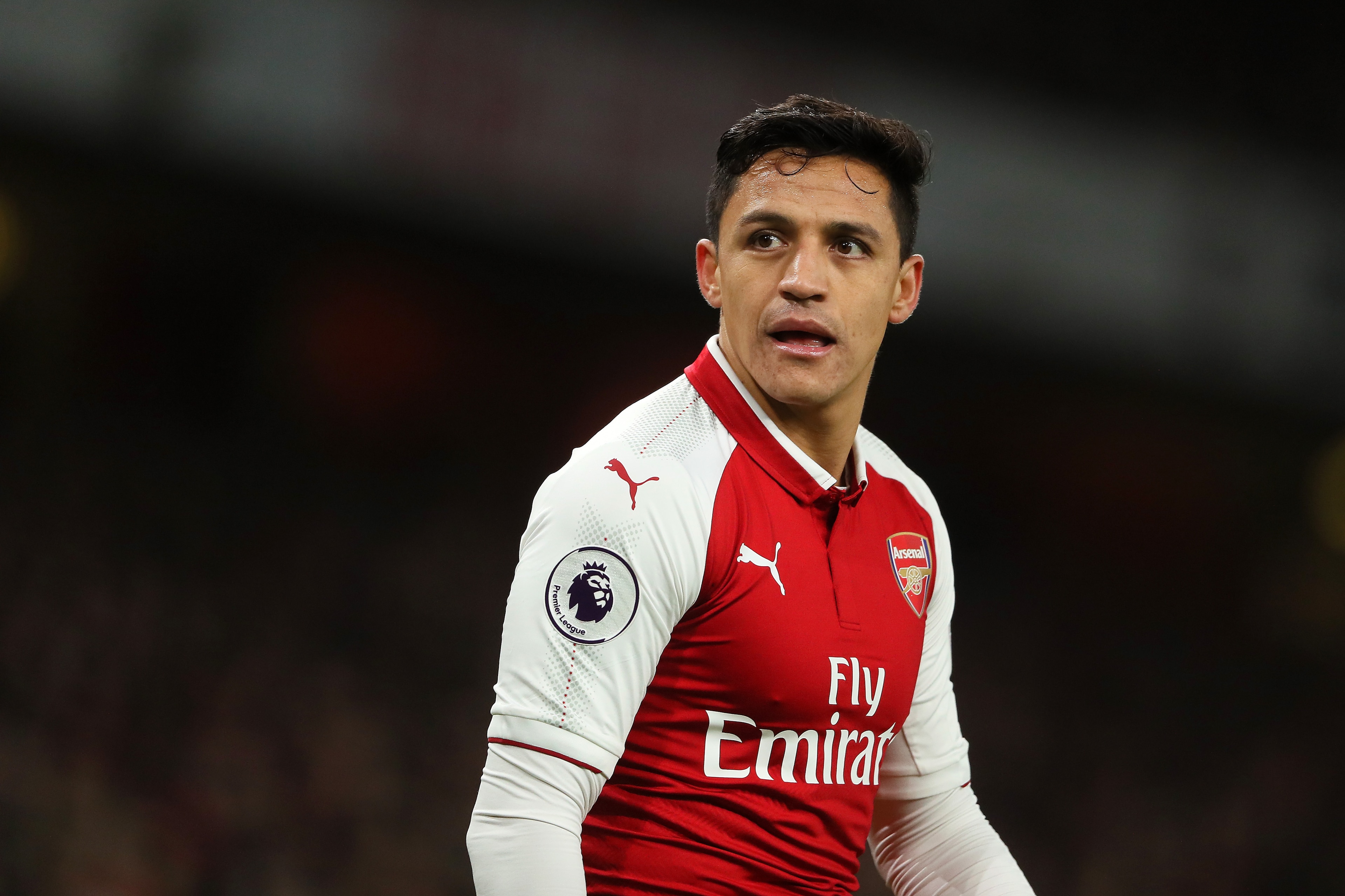 LONDON, ENGLAND - JANUARY 03:  Alexis Sanchez of Arsenal looks on during the Premier League match between Arsenal and Chelsea at Emirates Stadium on January 3, 2018 in London, England.  (Photo by Matthew Ashton - AMA/Getty Images)