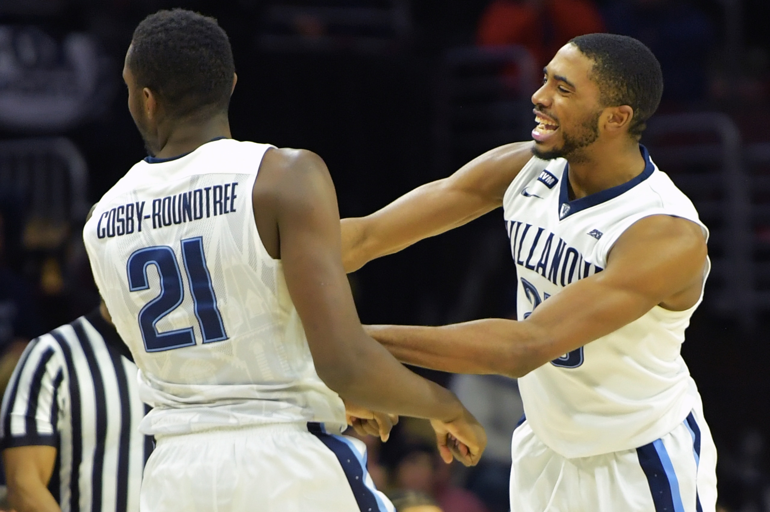 VILLANOVA, PA - JANUARY 06: Dhamir Cosby-Roundtree #21 and Mikal Bridges #25 of the Villanova Wildcats celebrate after a play against the Marquette Golden Eagles at The Wells Fago Center on January 6, 2018 in Philadelphia, Pennsylvania. Villanova won 100- VILLANOVA, PA - JANUARY 06: Dhamir Cosby-Roundtree #21 and Mikal Bridges #25 of the Villanova Wildcats celebrate after a play against the Marquette Golden Eagles at The Wells Fago Center on January 6, 2018 in Philadelphia, Pennsylvania. Villanova won 100-
