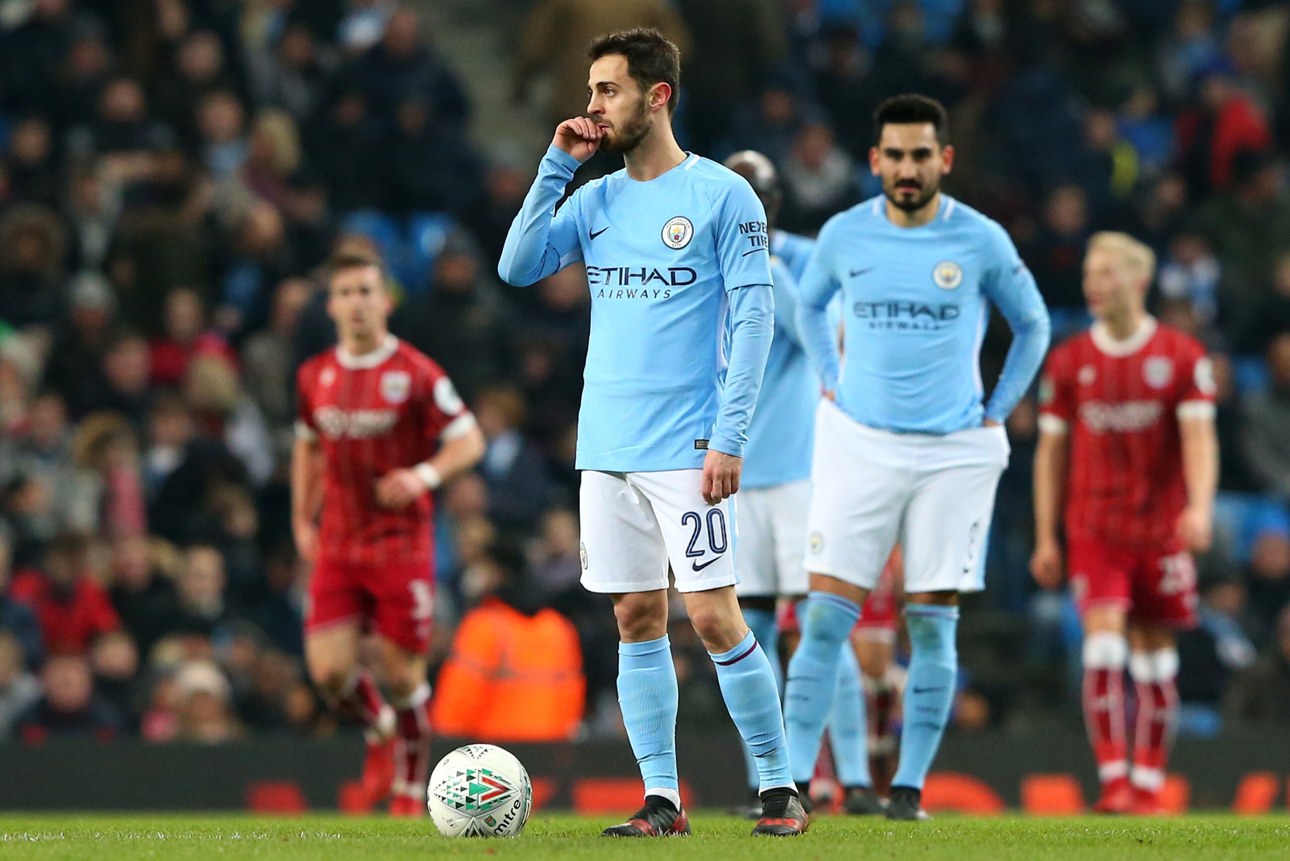 MANCHESTER, ENGLAND - JANUARY 09:  Bernardo Silva of Manchester City looks dejected after conceding the first goal during the Carabao Cup Semi-Final First Leg match between Manchester City and Bristol City at Etihad Stadium on January 9, 2018 in Mancheste