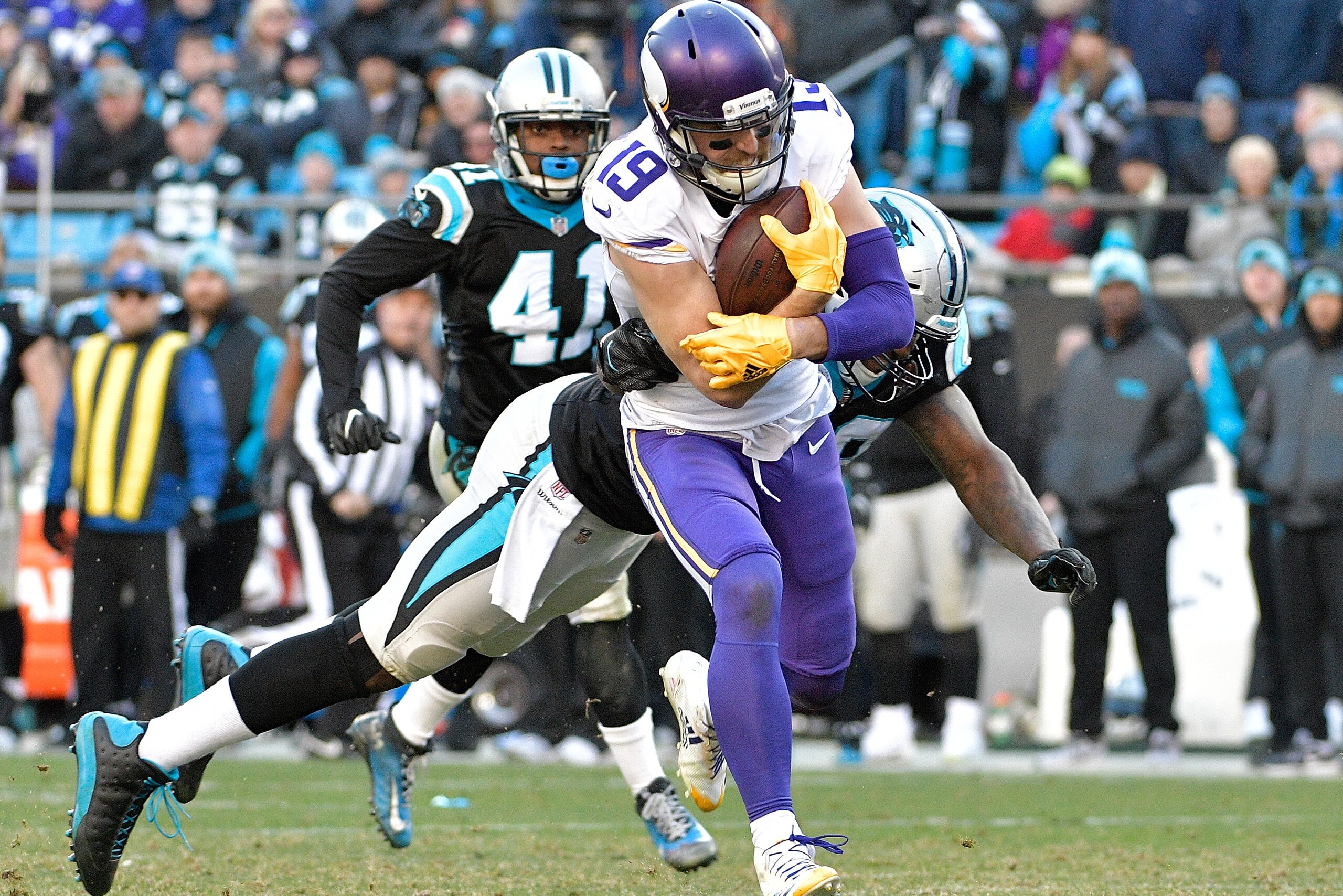 CHARLOTTE, NC - DECEMBER 10: Adam Thielen #19 of the Minnesota Vikings breaks away from Thomas Davis #58 of the Carolina Panthers for a touchdown duering the fourth quarter of their game at Bank of America Stadium on December 10, 2017 in Charlotte, North CHARLOTTE, NC - DECEMBER 10: Adam Thielen #19 of the Minnesota Vikings breaks away from Thomas Davis #58 of the Carolina Panthers for a touchdown duering the fourth quarter of their game at Bank of America Stadium on December 10, 2017 in Charlotte, North