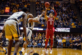MORGANTOWN, WV - JANUARY 06:  Trae Young #11 of the Oklahoma Sooners pulls up for three against the West Virginia Mountaineers at the WVU Coliseum on January 6, 2018 in Morgantown, West Virginia.  (Photo by Justin K. Aller/Getty Images)