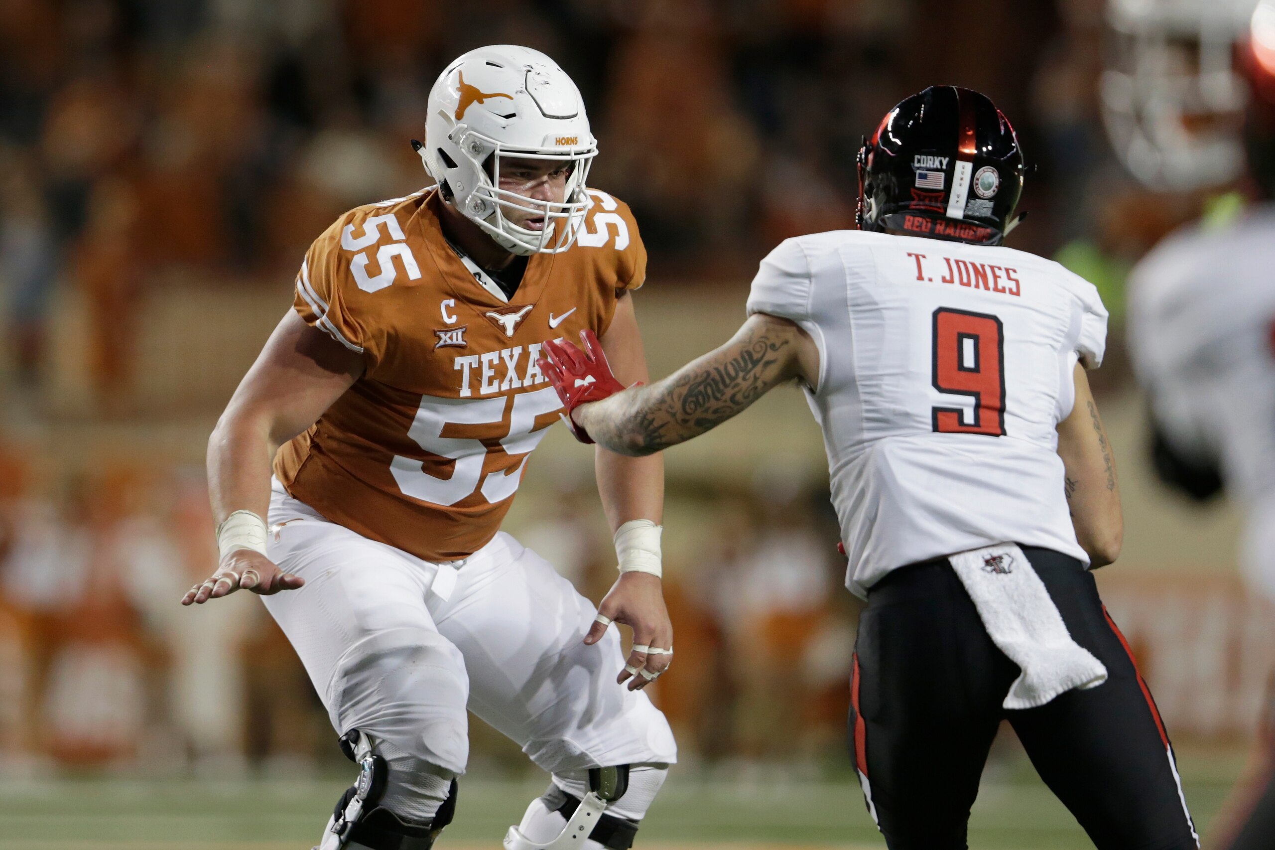 AUSTIN, TX - NOVEMBER 24: Connor Williams #55 of the Texas Longhorns blocks Tony Jones #9 of the Texas Tech Red Raiders in the fourth quarter at Darrell K Royal-Texas Memorial Stadium on November 24, 2017 in Austin, Texas. (Photo by Tim Warner/Getty Imag AUSTIN, TX - NOVEMBER 24: Connor Williams #55 of the Texas Longhorns blocks Tony Jones #9 of the Texas Tech Red Raiders in the fourth quarter at Darrell K Royal-Texas Memorial Stadium on November 24, 2017 in Austin, Texas. (Photo by Tim Warner/Getty Imag