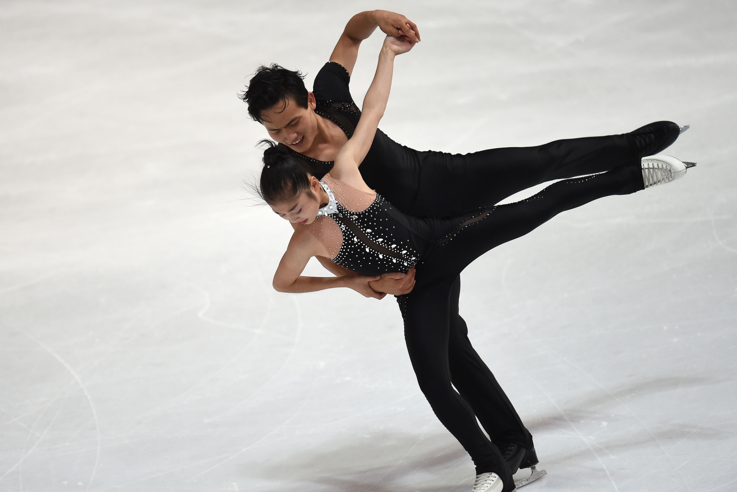 Ryom Tae-Ok and Kim Ju-Sik of North Korea perform during their pairs free skating program of the 49th Nebelhorn trophy figure skating competition in Oberstdorf, southern Germany, on September 29, 2017. / AFP PHOTO / Christof STACHE        (Photo credit sh