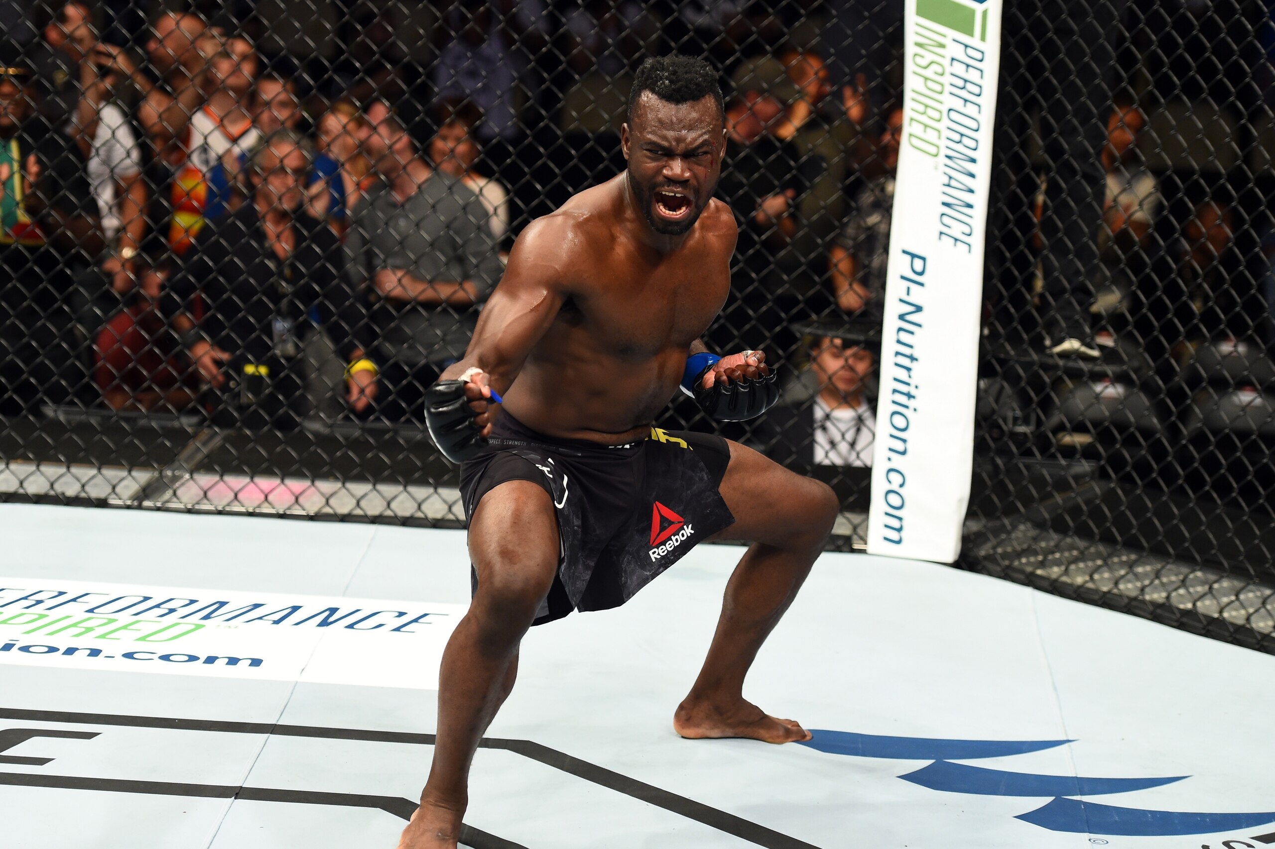 PITTSBURGH, PA - SEPTEMBER 16:  Uriah Hall of Jamaica celebrates after defeating Krzysztof Jotko of Poland in their middleweight bout during the UFC Fight Night event inside the PPG Paints Arena on September 16, 2017 in Pittsburgh, Pennsylvania. (Photo by