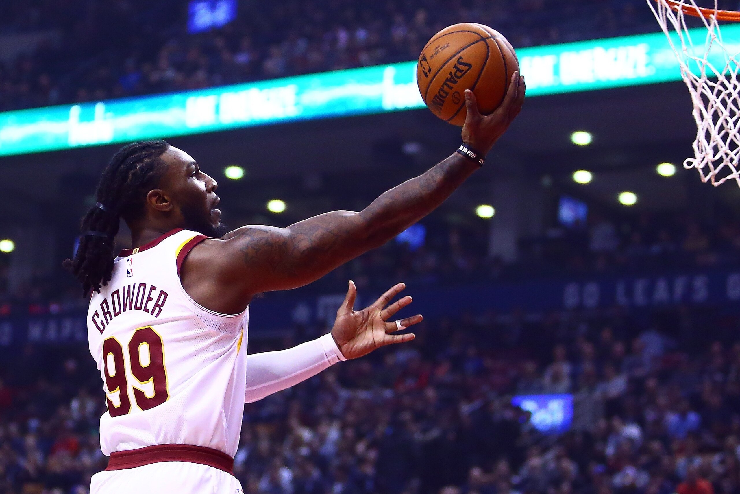 TORONTO, ON - JANUARY 11:  Jae Crowder #99 of the Cleveland Cavaliers shoots the ball during the first half of an NBA game against the Toronto Raptors at Air Canada Centre on January 11, 2018 in Toronto, Canada.  NOTE TO USER: User expressly acknowledges 
