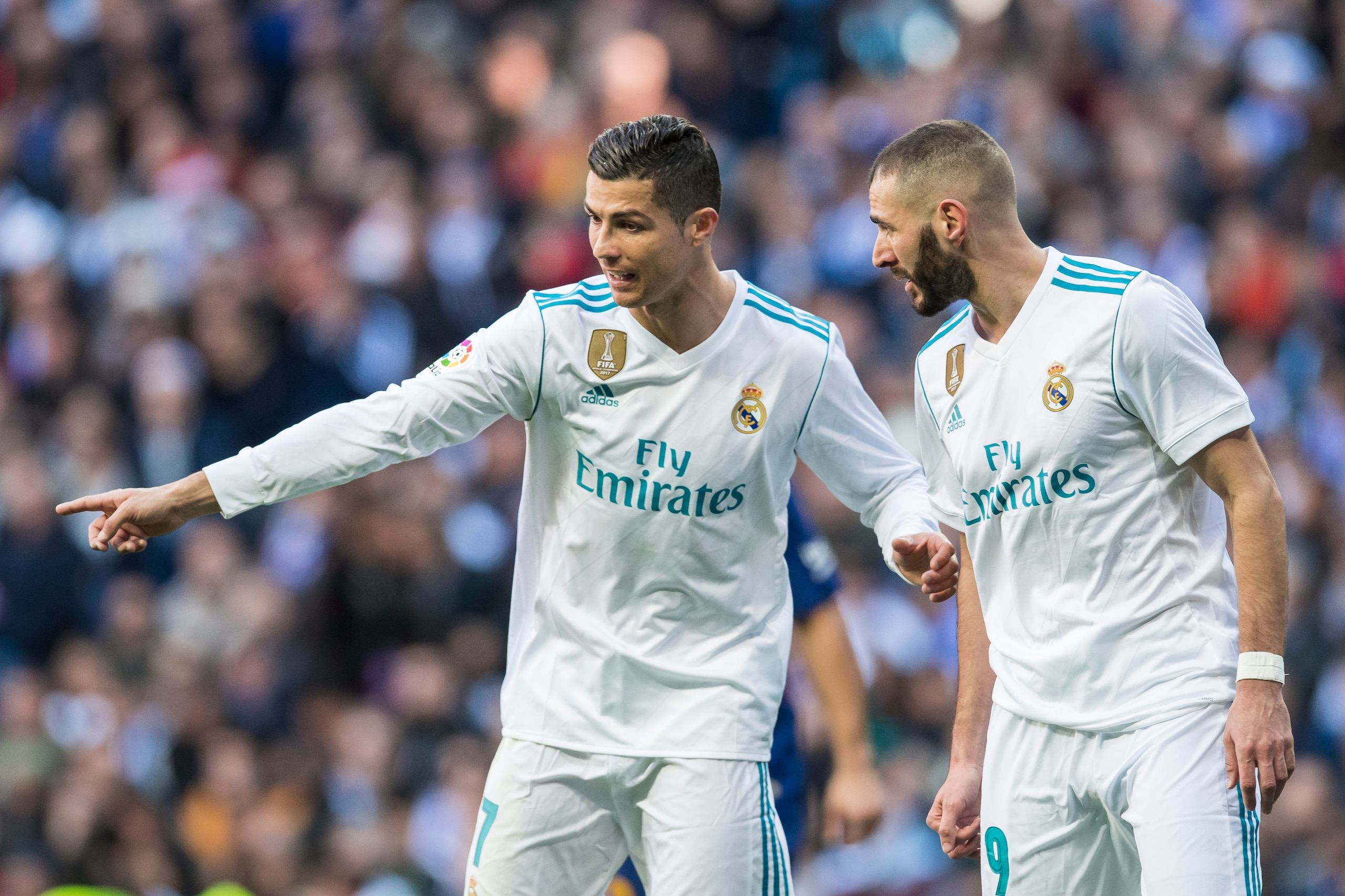 MADRID, SPAIN - DECEMBER 23: Cristiano Ronaldo (L) of Real Madrid talks to teammate Karim Benzema during the La Liga 2017-18 match between Real Madrid and FC Barcelona at Santiago Bernabeu Stadium on December 23 2017 in Madrid, Spain. (Photo by Power Spor