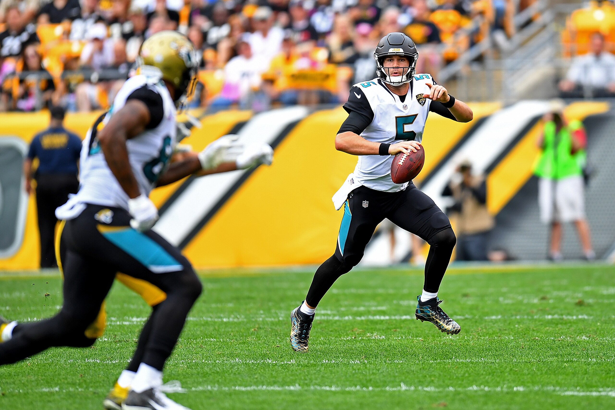 PITTSBURGH, PA - OCTOBER 08: Blake Bortles #5 of the Jacksonville Jaguars scrambles out of the pocket in the first half during the game against the Pittsburgh Steelers at Heinz Field on October 8, 2017 in Pittsburgh, Pennsylvania. (Photo by Joe Sargent/Ge