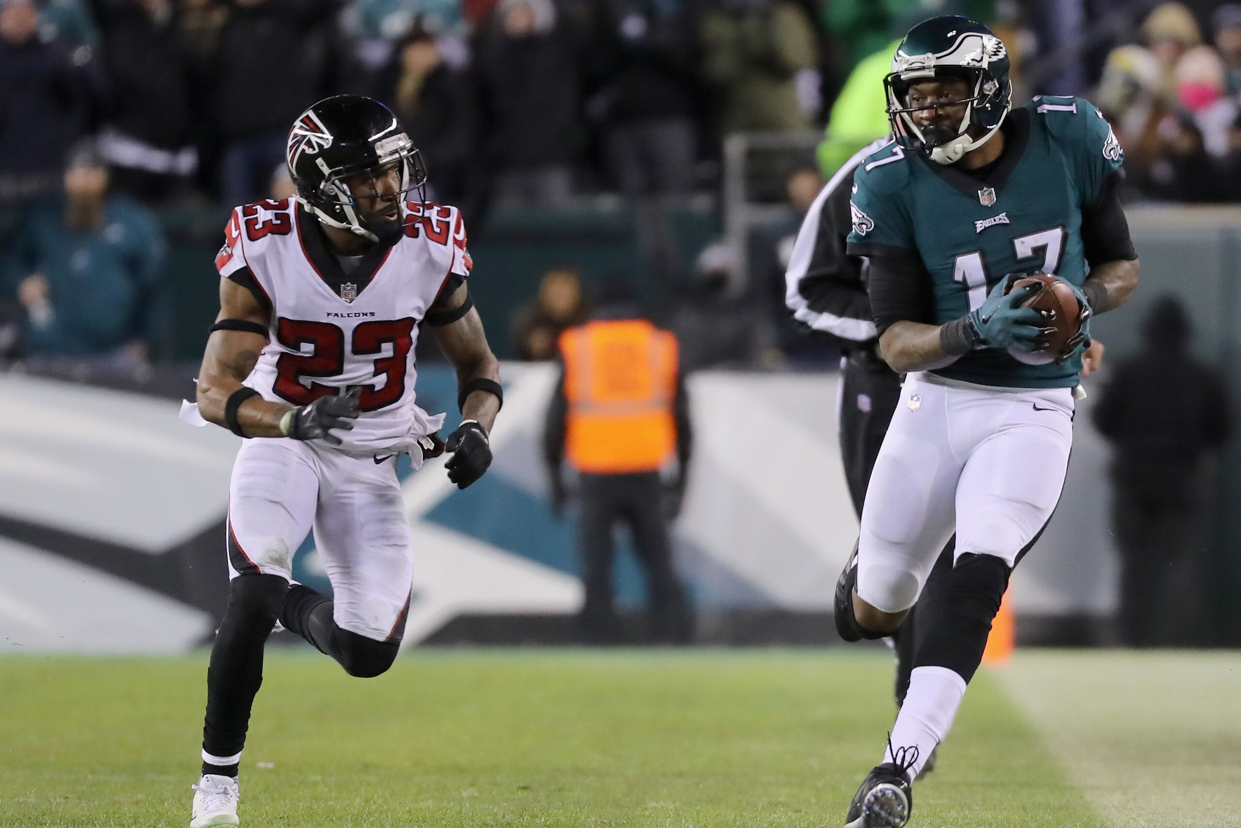 PHILADELPHIA, PA - JANUARY 13: Wide receiver Alshon Jeffery #17 of the Philadelphia Eagles runs the ball against cornerback Robert Alford #23 of the Atlanta Falcons during the third quarter in the NFC Divisional Playoff game at Lincoln Financial Field on 