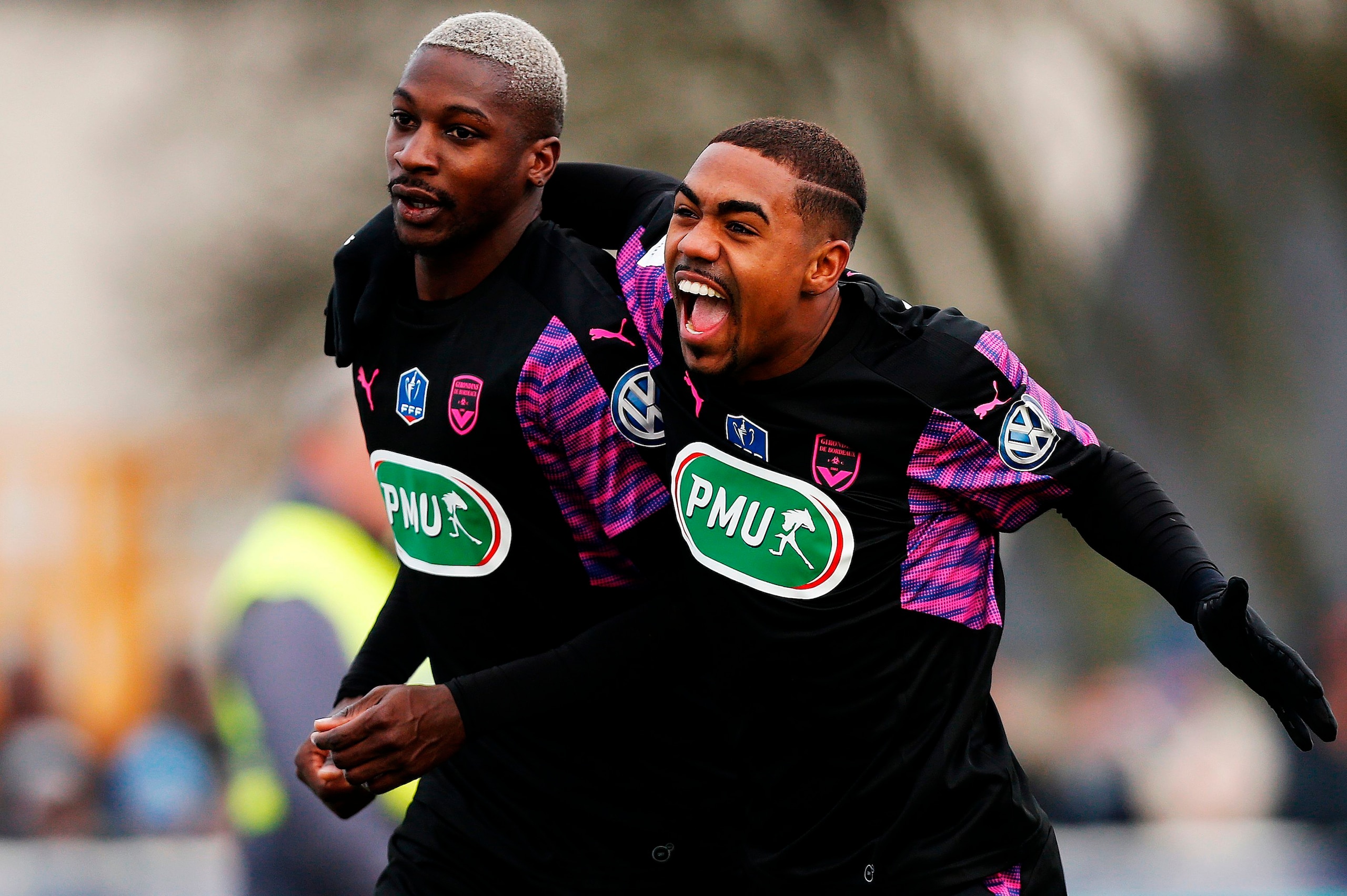 Bordeaux's Senegalese midfielder Younousse Sankhare (L) is congratulated by Bordeaux's forward Malcom (R) after scoring a goal during the French Cup football match between Granville (USG) and Bordeaux (USG) on January 7, 2018 at the Louis Dior Stadium in Bordeaux's Senegalese midfielder Younousse Sankhare (L) is congratulated by Bordeaux's forward Malcom (R) after scoring a goal during the French Cup football match between Granville (USG) and Bordeaux (USG) on January 7, 2018 at the Louis Dior Stadium in