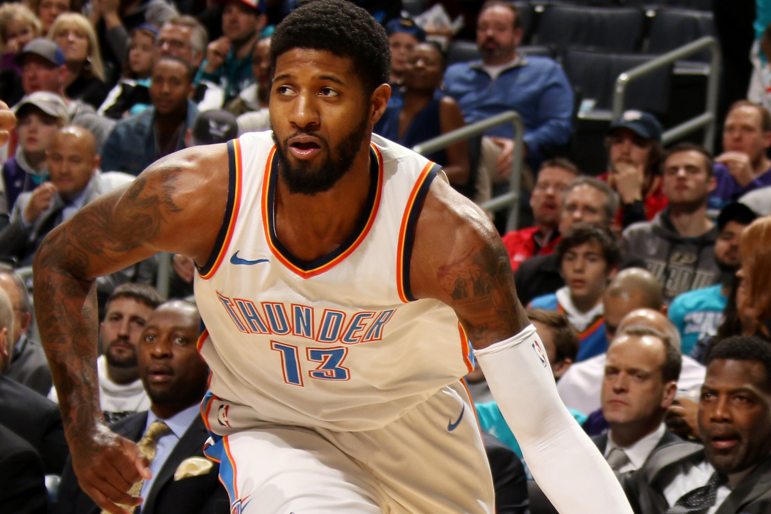 CHARLOTTE, NC - JANUARY 13: Paul George #13 of the Oklahoma City Thunder handles the ball during the game against the Charlotte Hornets on January 13, 2018 at Spectrum Center in Charlotte, North Carolina. NOTE TO USER: User expressly acknowledges and agre