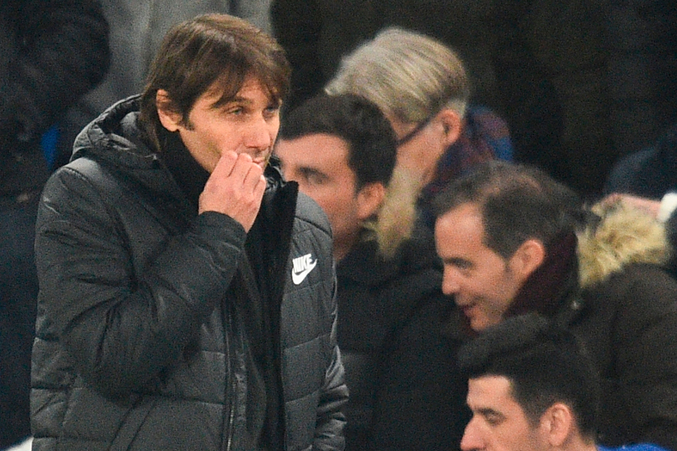 Chelsea's Italian head coach Antonio Conte gestures on the touchline during the English Premier League football match between Chelsea and Leicester City at Stamford Bridge in London on January 13, 2018. / AFP PHOTO / Glyn KIRK / RESTRICTED TO EDITORIAL US