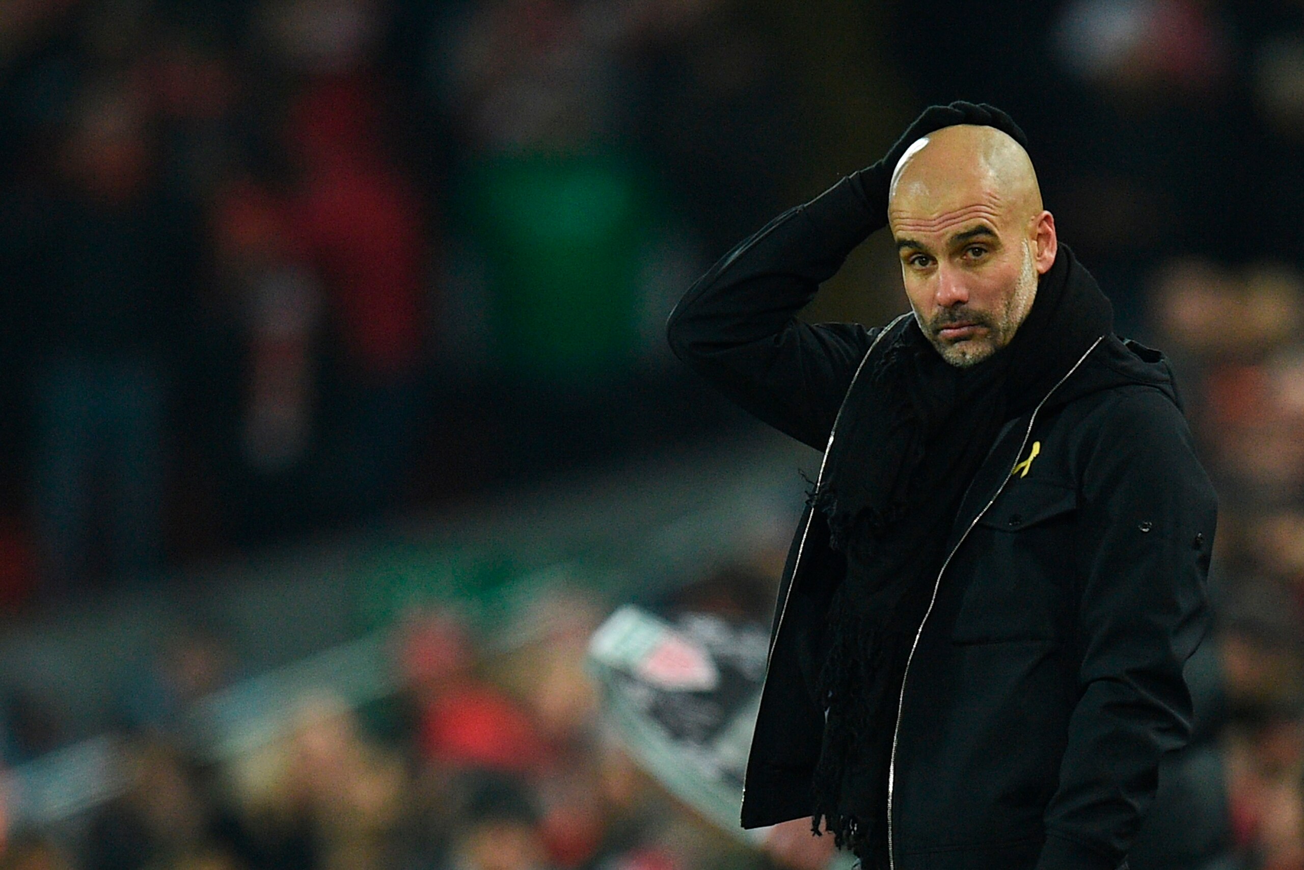 Manchester City's Spanish manager Pep Guardiola reacts on the touchline during the English Premier League football match between Liverpool and Manchester City at Anfield in Liverpool, north west England on January 14, 2018. / AFP PHOTO / Oli SCARFF / REST
