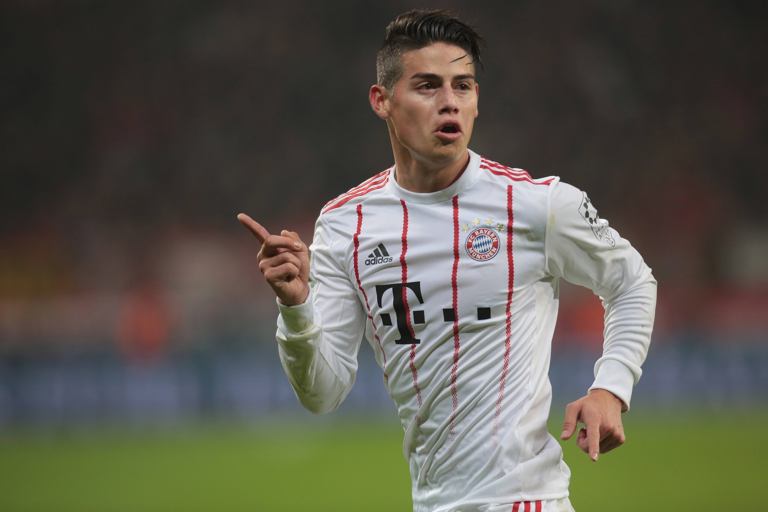 LEVERKUSEN, GERMANY - JANUARY 12: James Rodriguez of Muenchen celebrates after scoring his team`s third goal during the Bundesliga match between Bayer 04 Leverkusen and FC Bayern Muenchen at BayArena on January 12, 2018 in Leverkusen, Germany. (Photo by T