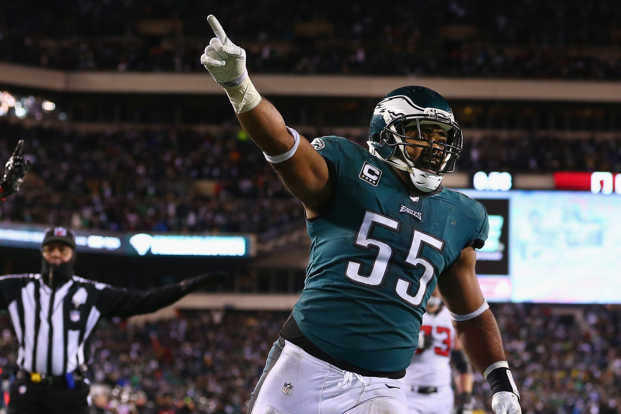 PHILADELPHIA, PA - JANUARY 13: Defensive end Brandon Graham #55 and cornerback Jalen Mills #31 of the Philadelphia Eagles celebrate against the Atlanta Falcons during the fourth quarter in the NFC Divisional Playoff game at Lincoln Financial Field on Janu