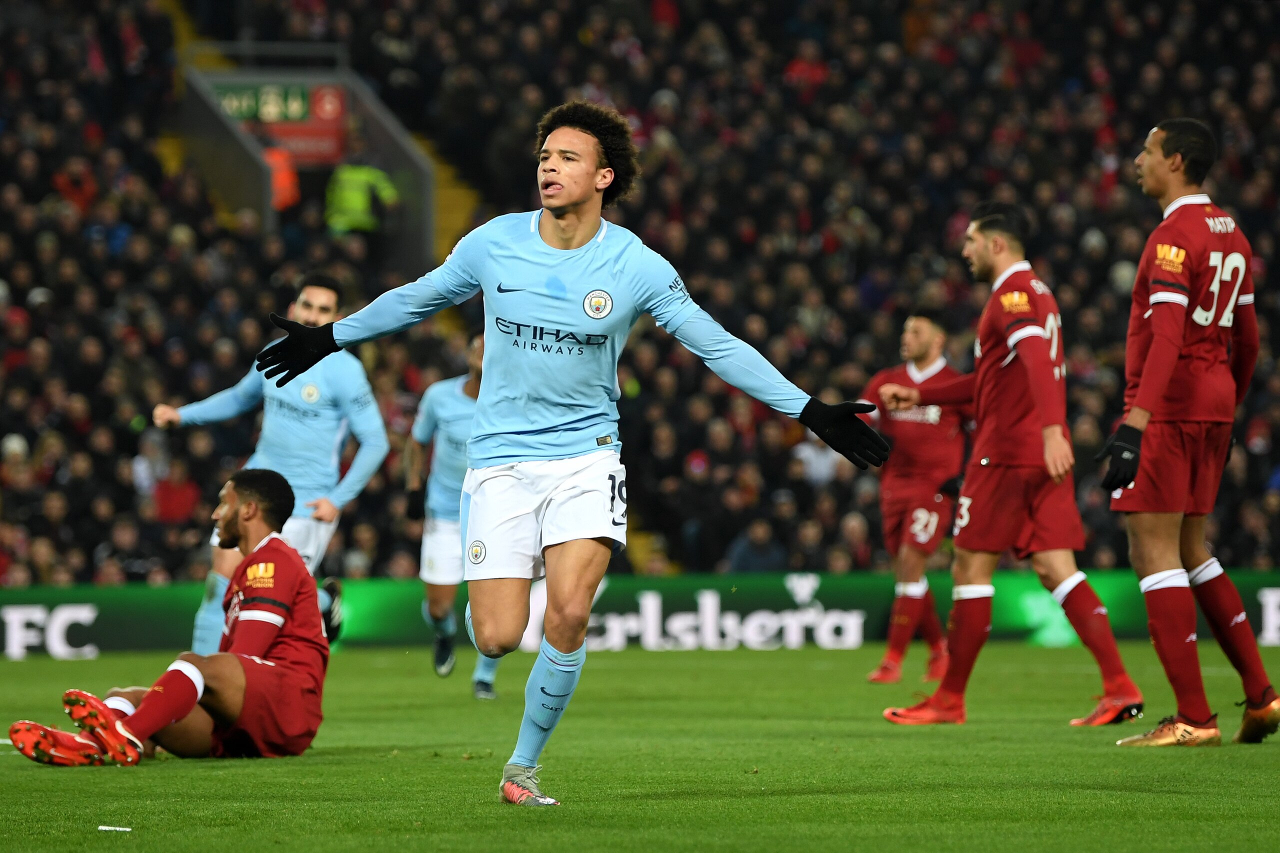LIVERPOOL, ENGLAND - JANUARY 14: Leroy Sane of Manchester City celebrates after scoring the first Manchester City goal during the Premier League match between Liverpool and Manchester City at Anfield on January 14, 2018 in Liverpool, England. (Photo by LIVERPOOL, ENGLAND - JANUARY 14: Leroy Sane of Manchester City celebrates after scoring the first Manchester City goal during the Premier League match between Liverpool and Manchester City at Anfield on January 14, 2018 in Liverpool, England. (Photo by