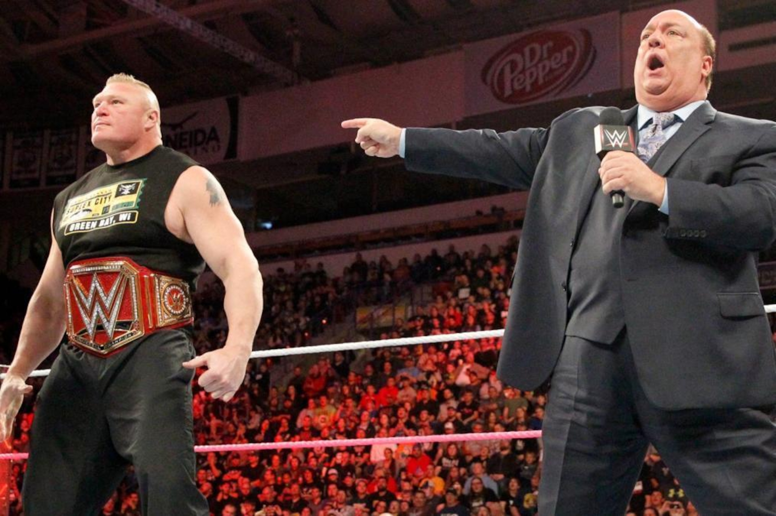 Brock Lesnar and Paul Heyman during a promo on Raw.