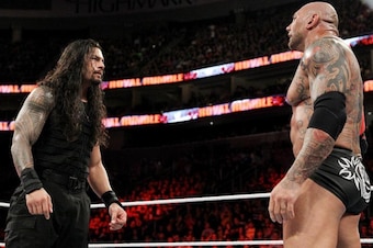Roman Reigns and Batista stare each other down near the end of the 2014 Royal Rumble.