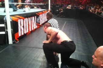 Kane waits for his moment to eliminate CM Punk.