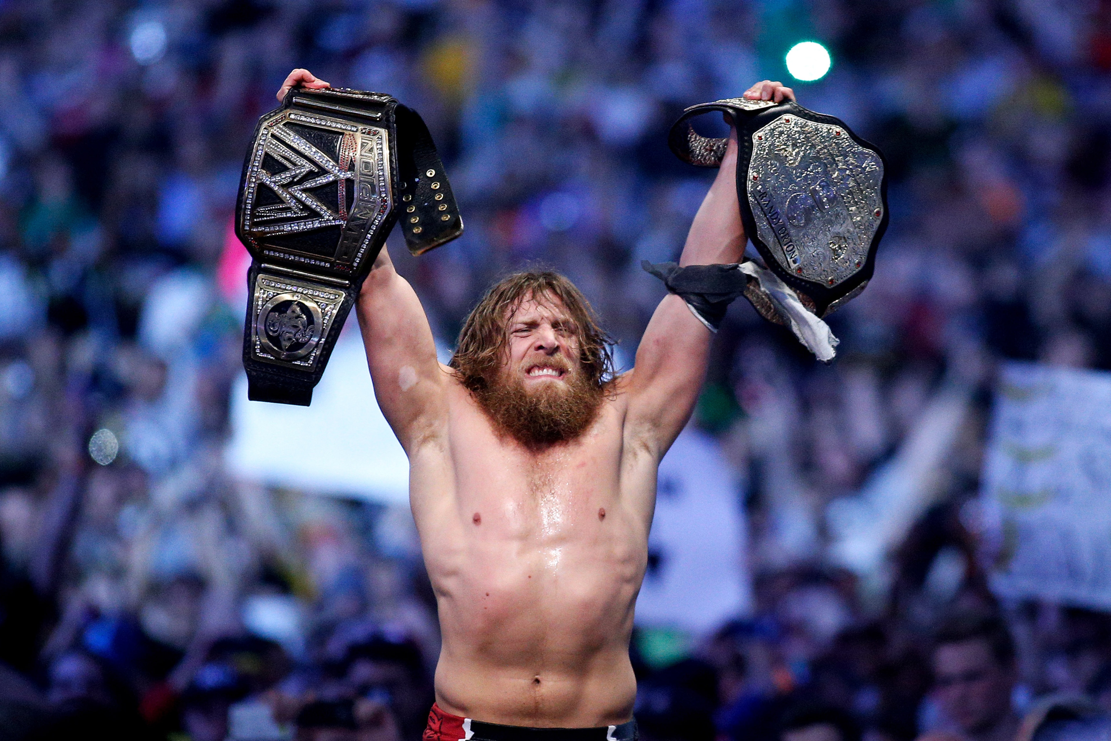 Daniel Bryan celebrates winning the WWE Championship at WrestleMania XXX.