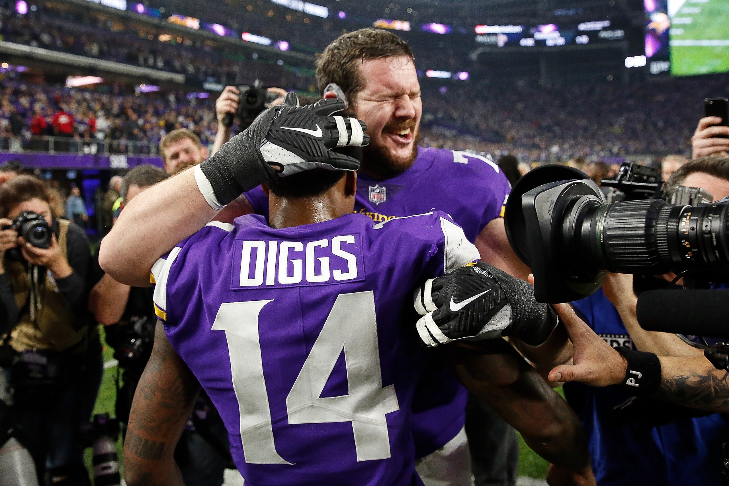 MINNEAPOLIS, MN - JANUARY 14:  Stefon Diggs #14 of the Minnesota Vikings celebrates with teammates after defeating the New Orleans Saints in the NFC Divisional Playoff game at U.S. Bank Stadium on January 14, 2018 in Minneapolis, Minnesota.  (Photo by Jam